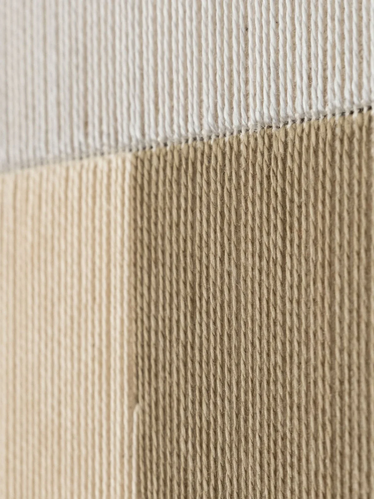Close-up view of vertical cotton threads in First Light In The Grove artwork by Kateryna Chernetska.