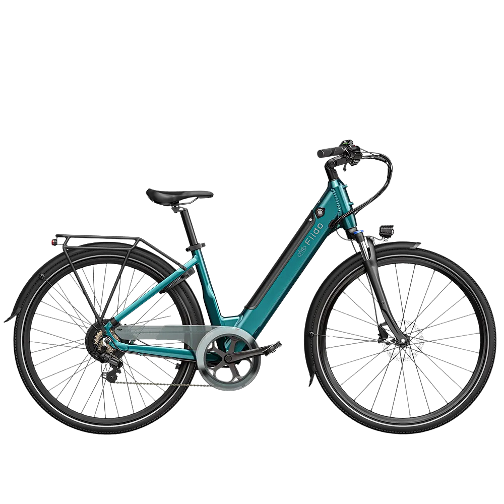 Electric bicycle, green frame, black tires, and black saddle, with a rear rack and disc brakes.