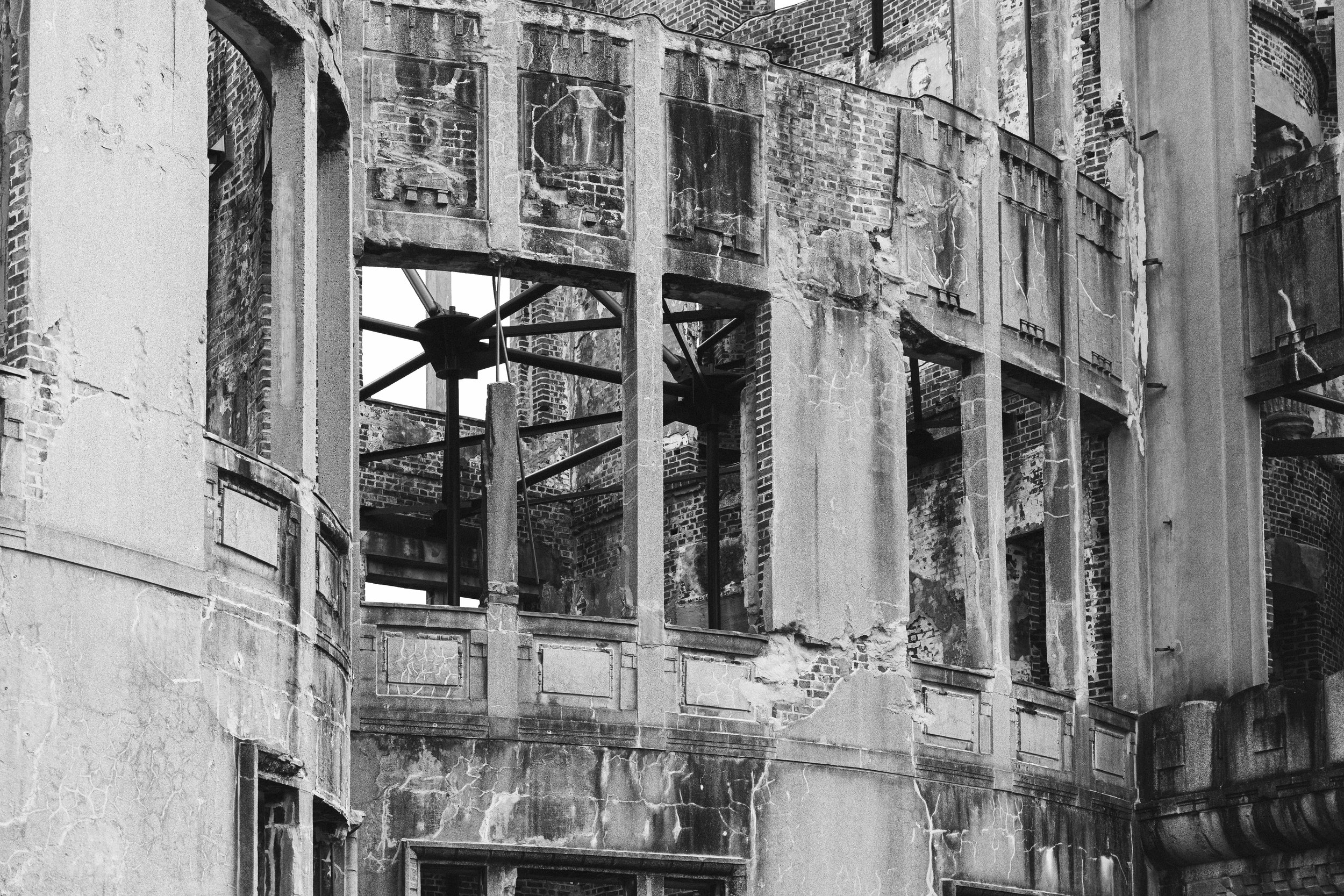 Interior structural remains of the Genbaku Dome, its exposed steel beams and brick walls frozen in time since 1945.