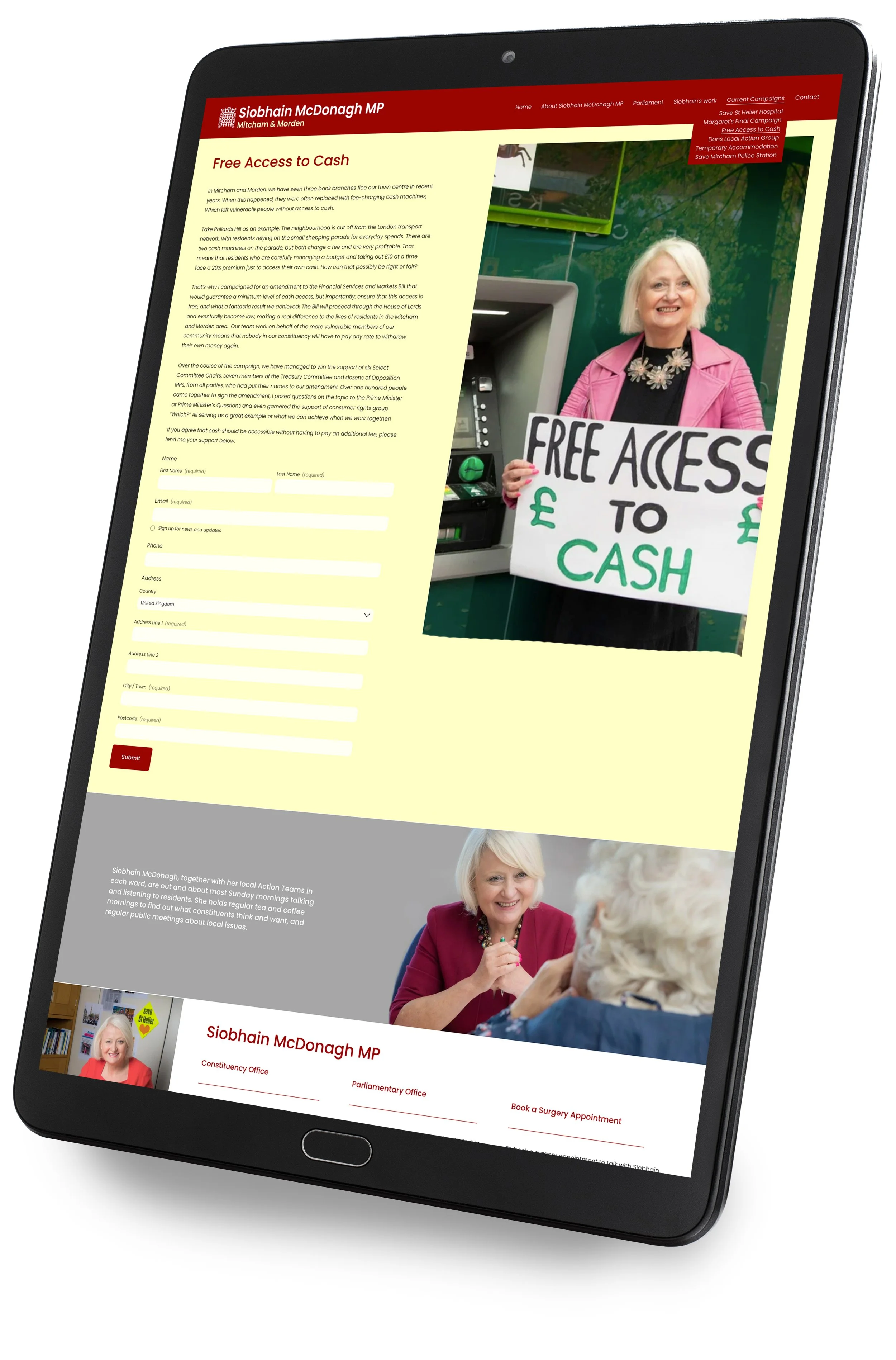 A tablet screen displaying a website with a photo of an older woman with white hair wearing a pink jacket, holding a sign that reads 'Free Access to Cash,' standing next to an ATM. The website is for Siobhain McDonagh MP and features information about her constituency, campaigns, and contact details.
