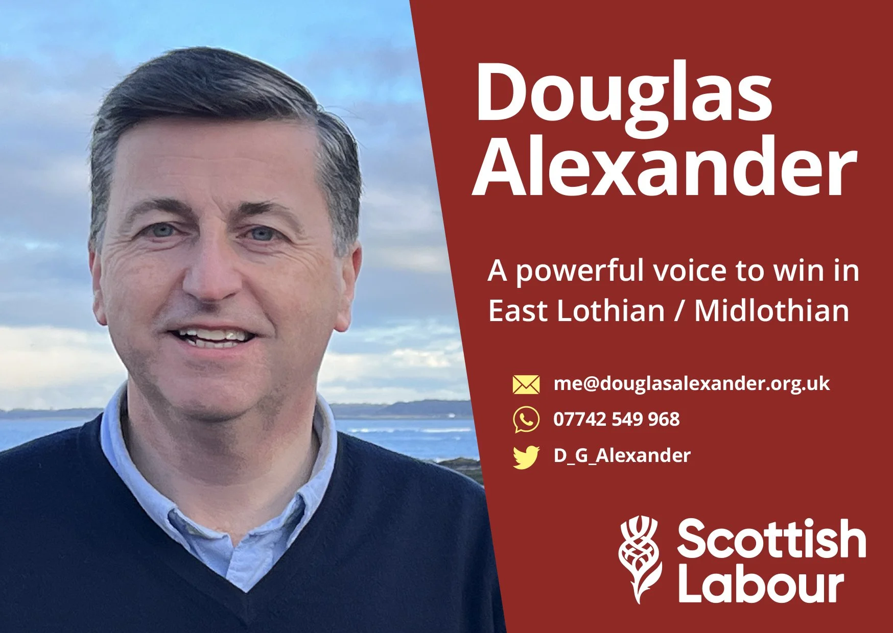 A political campaign poster featuring Douglas Alexander, a middle-aged man with blue eyes and dark hair, smiling outdoors with a body of water and cloudy sky in the background. The poster includes his name, contact information, social media handle, a