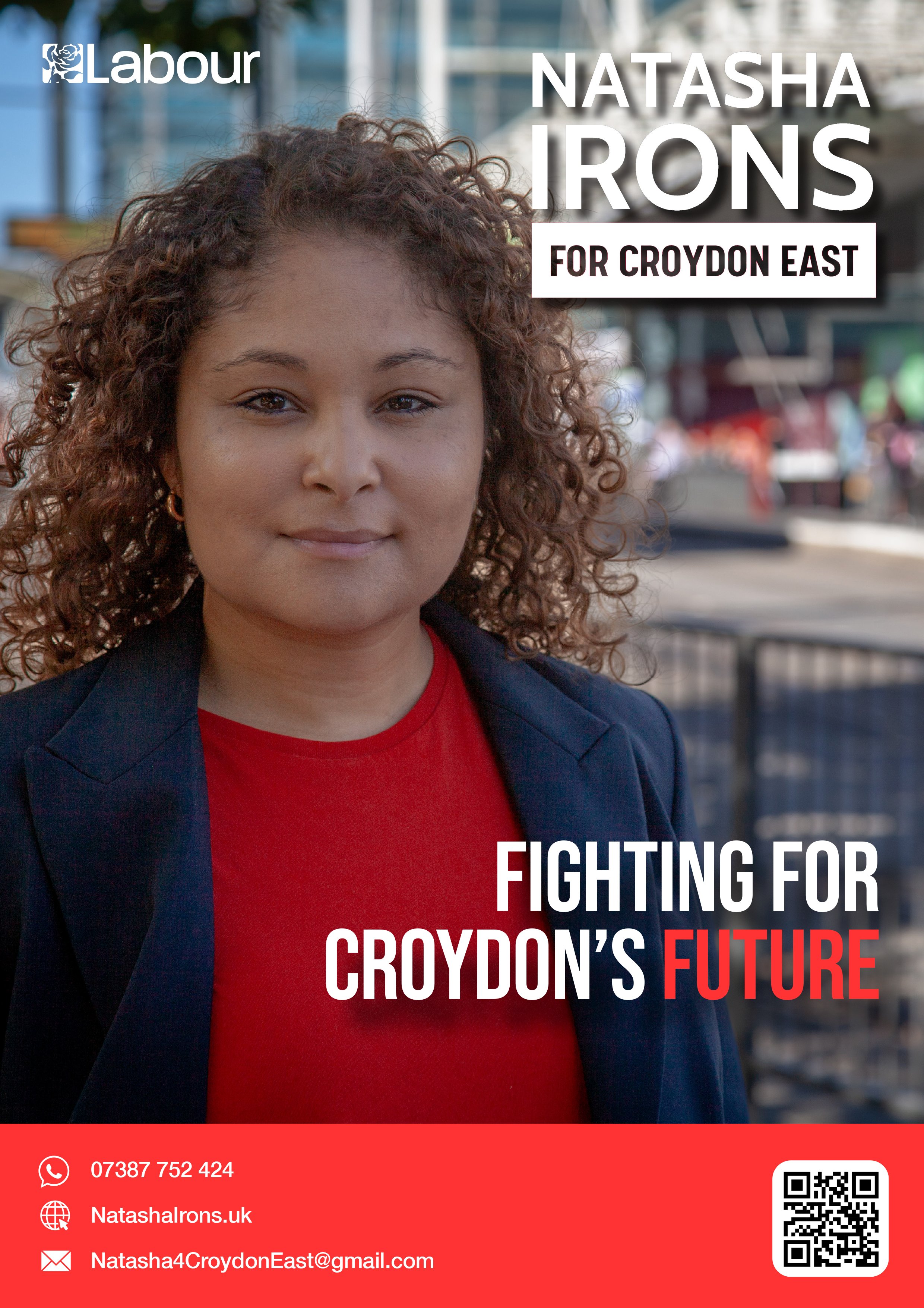 A woman with curly hair wearing a red shirt and dark blazer, standing outdoors in front of a city background, promoting her campaign for Croydon East with text overlay and contact information.