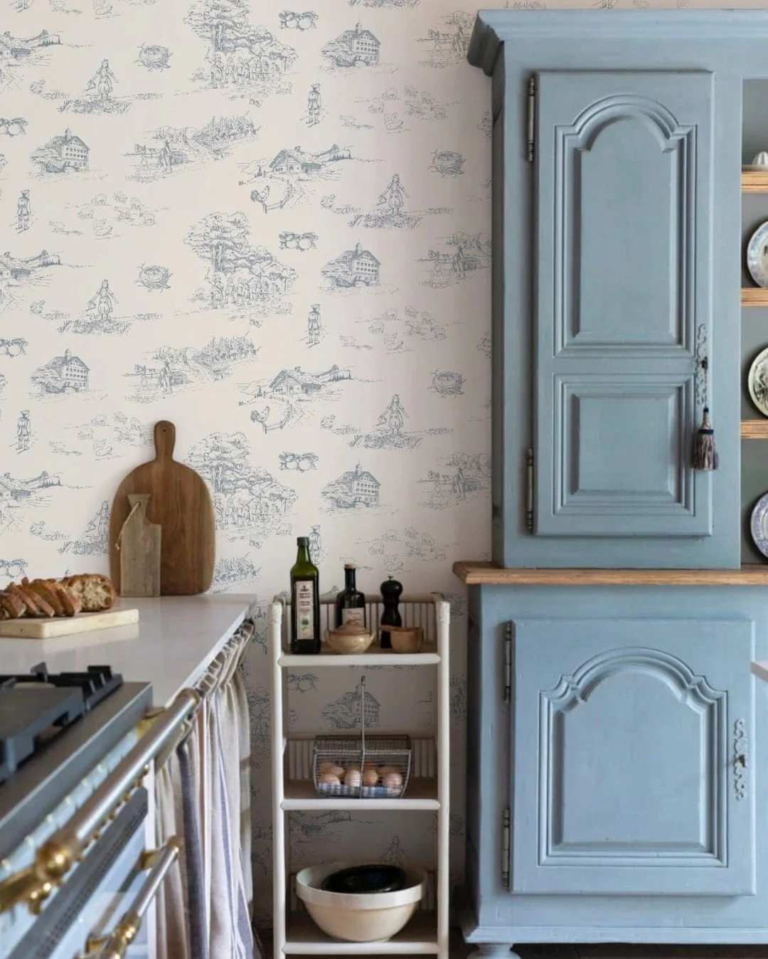 What if a wallpaper could feel like a quiet walk through the Swiss countryside? This Toile de Jouy was inspired by rural life in Switzerland at the beginning of the last century &mdash; small villages, everyday gestures, mountain air, and the poetic 
