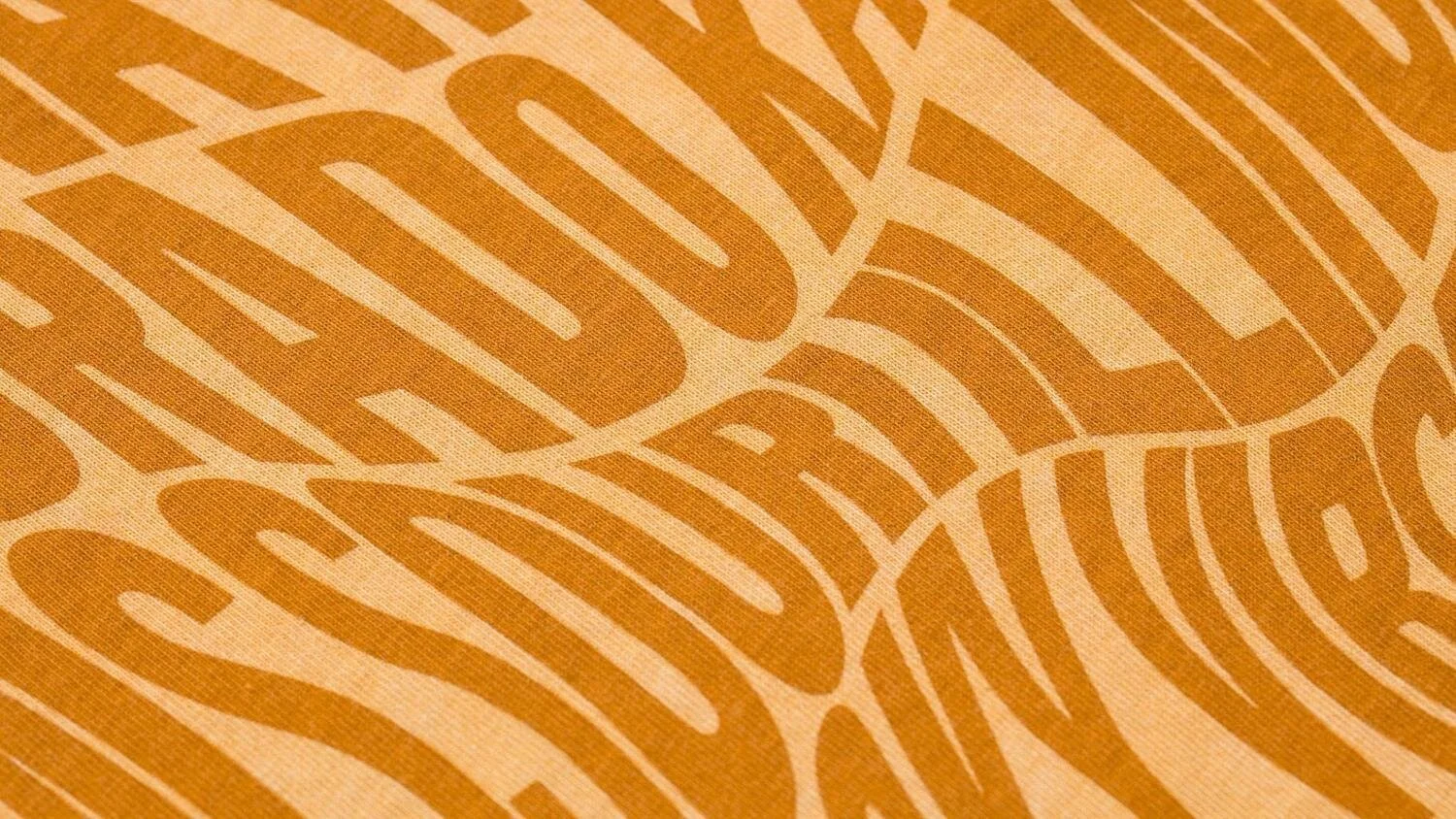 NWT01XX_GOR_H1-21_Women_s+Nomad+Cotton+T-Shirt_Golden+Orange_Detail_1-Web-16x9-Final.jpeg