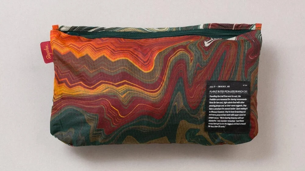 NWP01XX_MUL_H1-21_Women_s+Nomad+Wind+Jacket_Multicolour_Detail-5-Web-16x9-Final.jpeg
