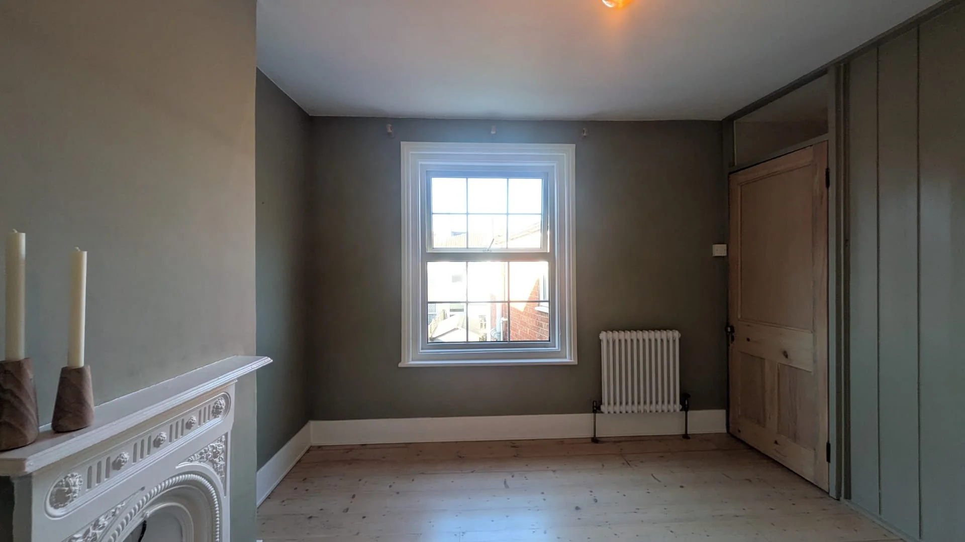 Transformation with the new crisp white ceiling using Tikkurila anti-reflex white 2 and woodwork using Dulux Trade Dulux Trade Vinyl Matt in Olive Tree