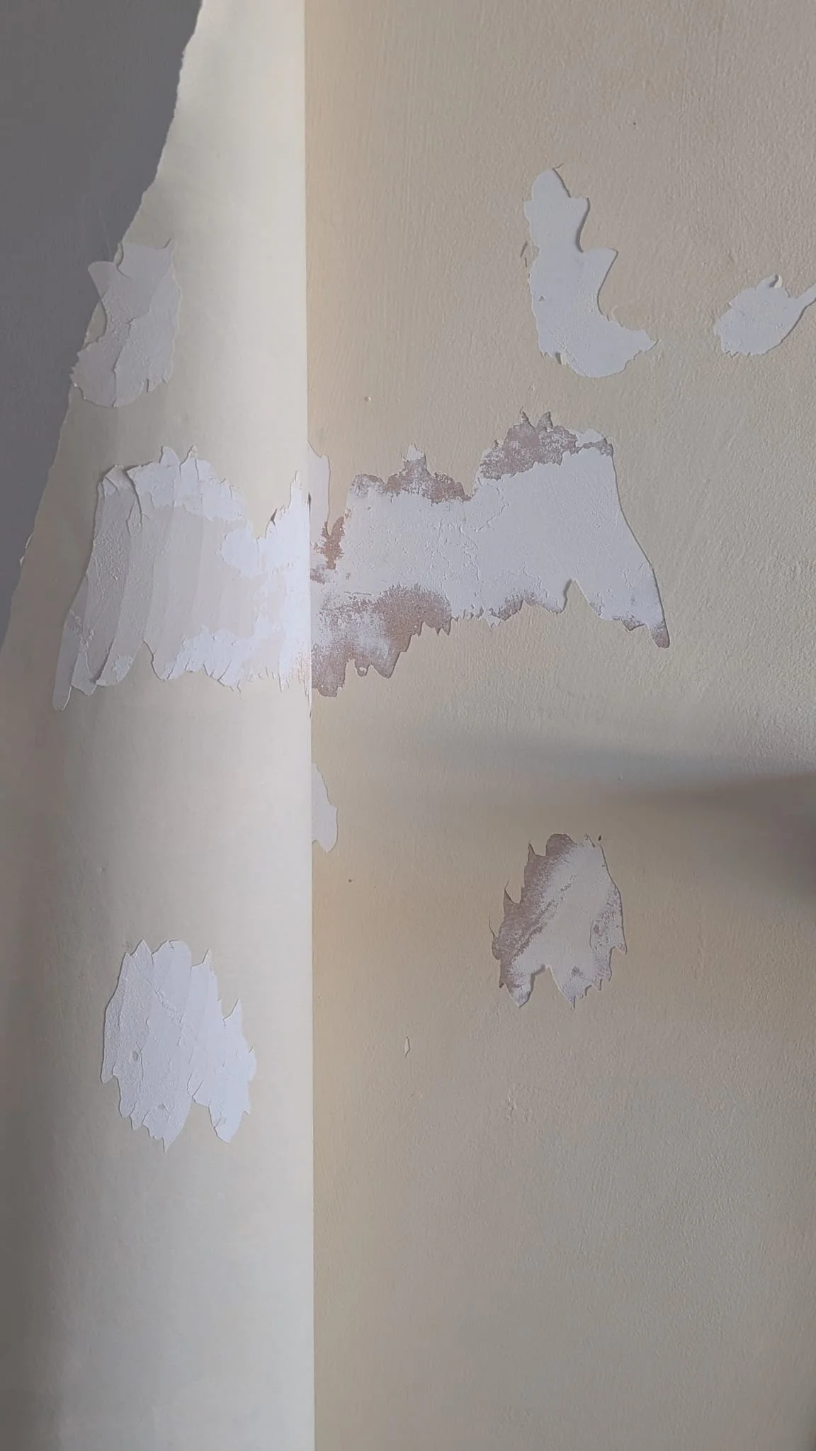 Chimney after wallpaper removal before skimming and sanding