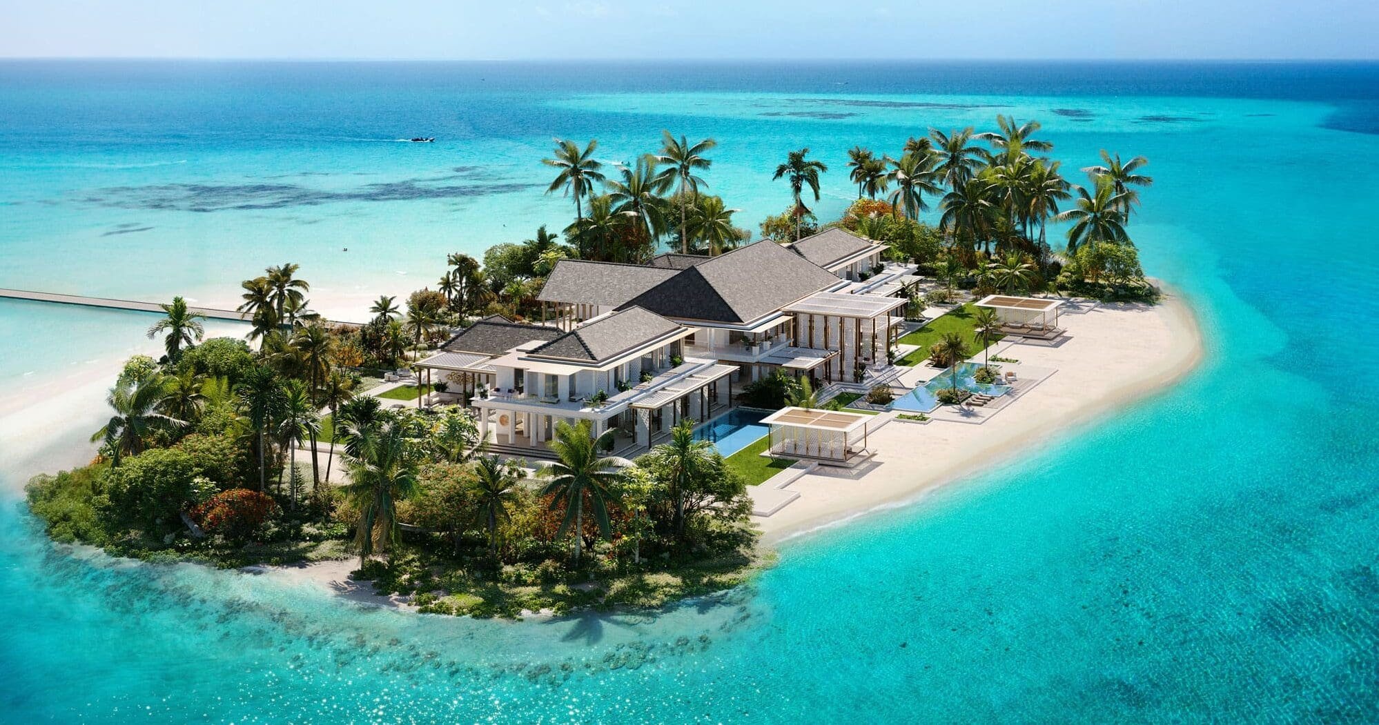 Aerial view of modern beachfront resort with multiple pools, greenery, and overwater bungalows by turquoise ocean.