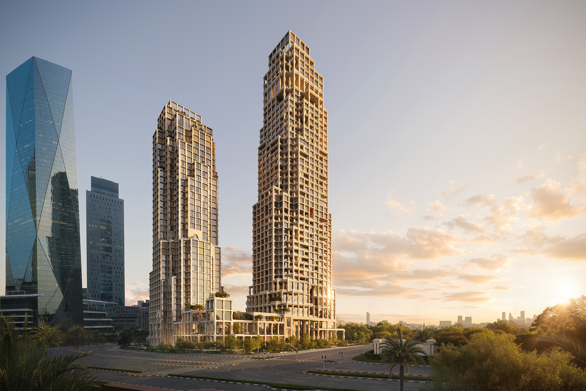 Modern high-rise buildings with mixed architectural styles in an urban area at sunset.