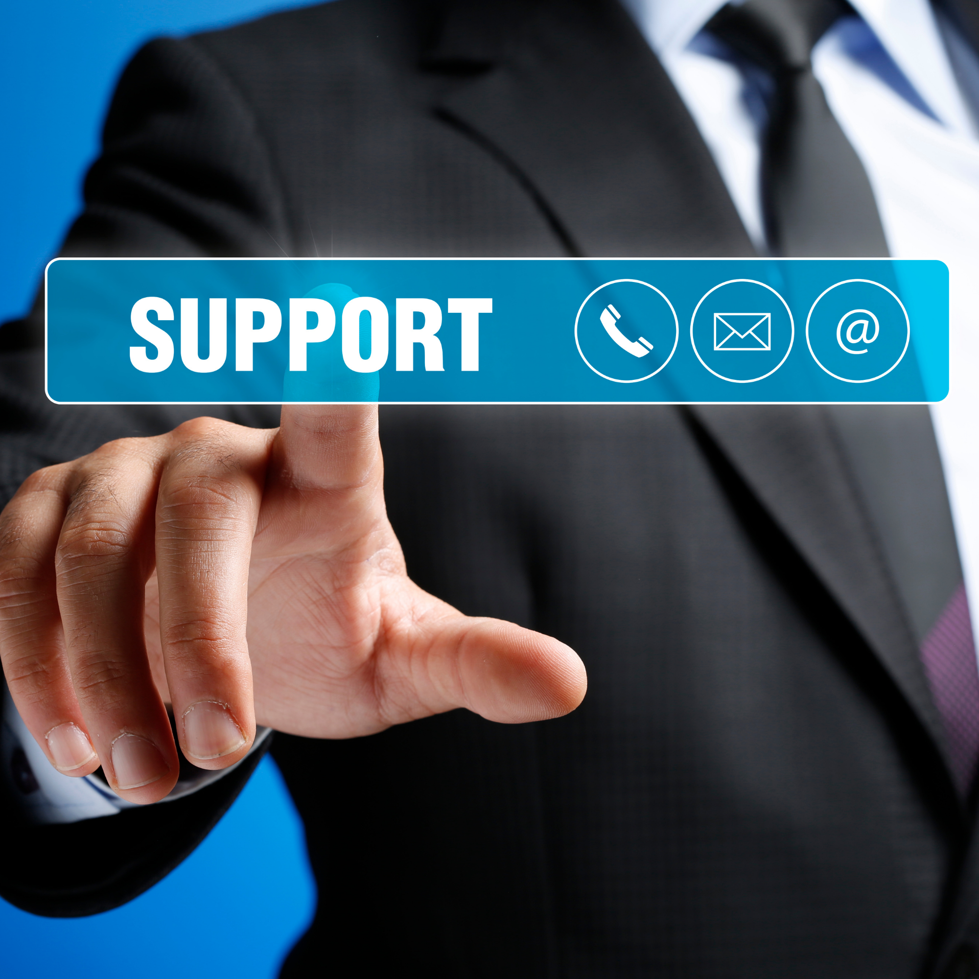 Close-up of a person in a business suit pressing a support button icon on a digital touchscreen interface with icons for phone, email, and at sign, against a blue and black background.