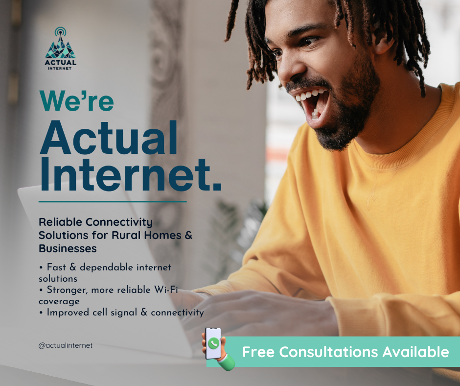 A man with dreadlocks and a beard, wearing a yellow sweatshirt, smiling and looking at his phone. The image promotes reliable internet solutions for rural homes and businesses, with text highlighting fast internet, improved Wi-Fi coverage, and cell signal. There is a logo for Actual Internet and a message offering free consultations.