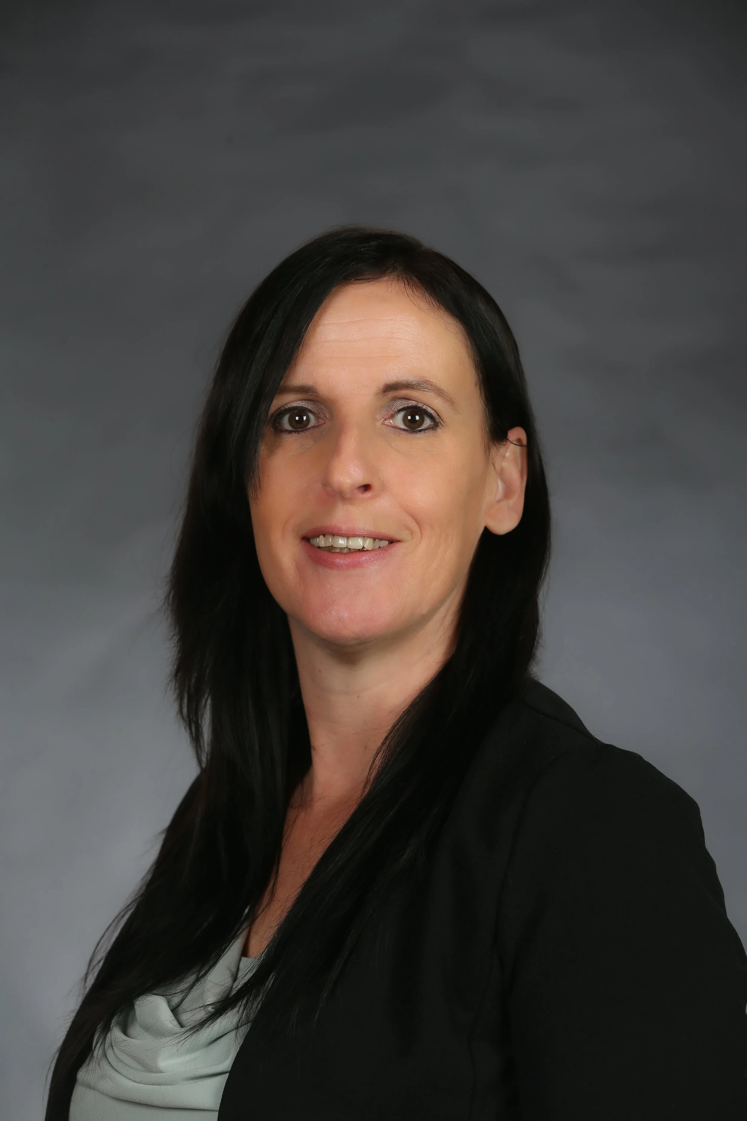 A photograph of Megan Reynolds, Grant Consultant.