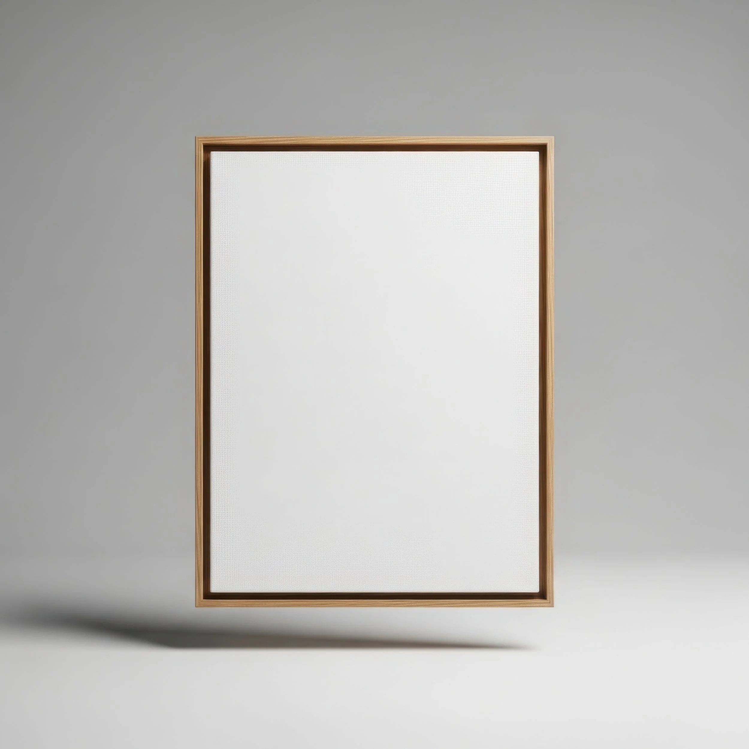 A whiteboard with a wooden frame hanging on a plain gray wall.