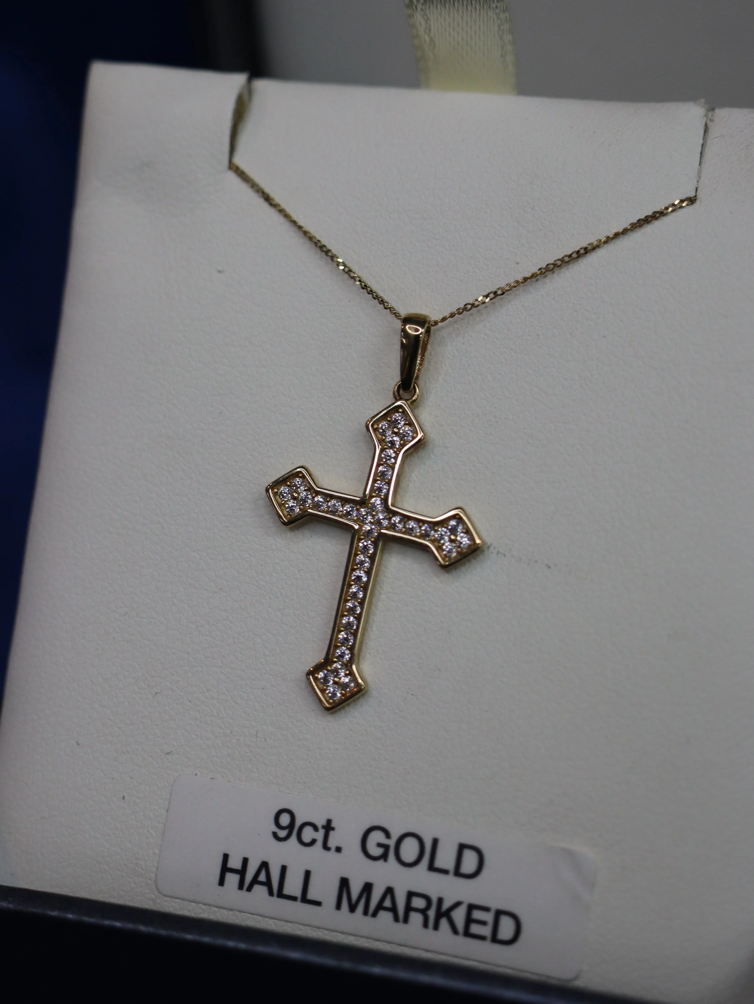 Gold Gothic style stone set cross