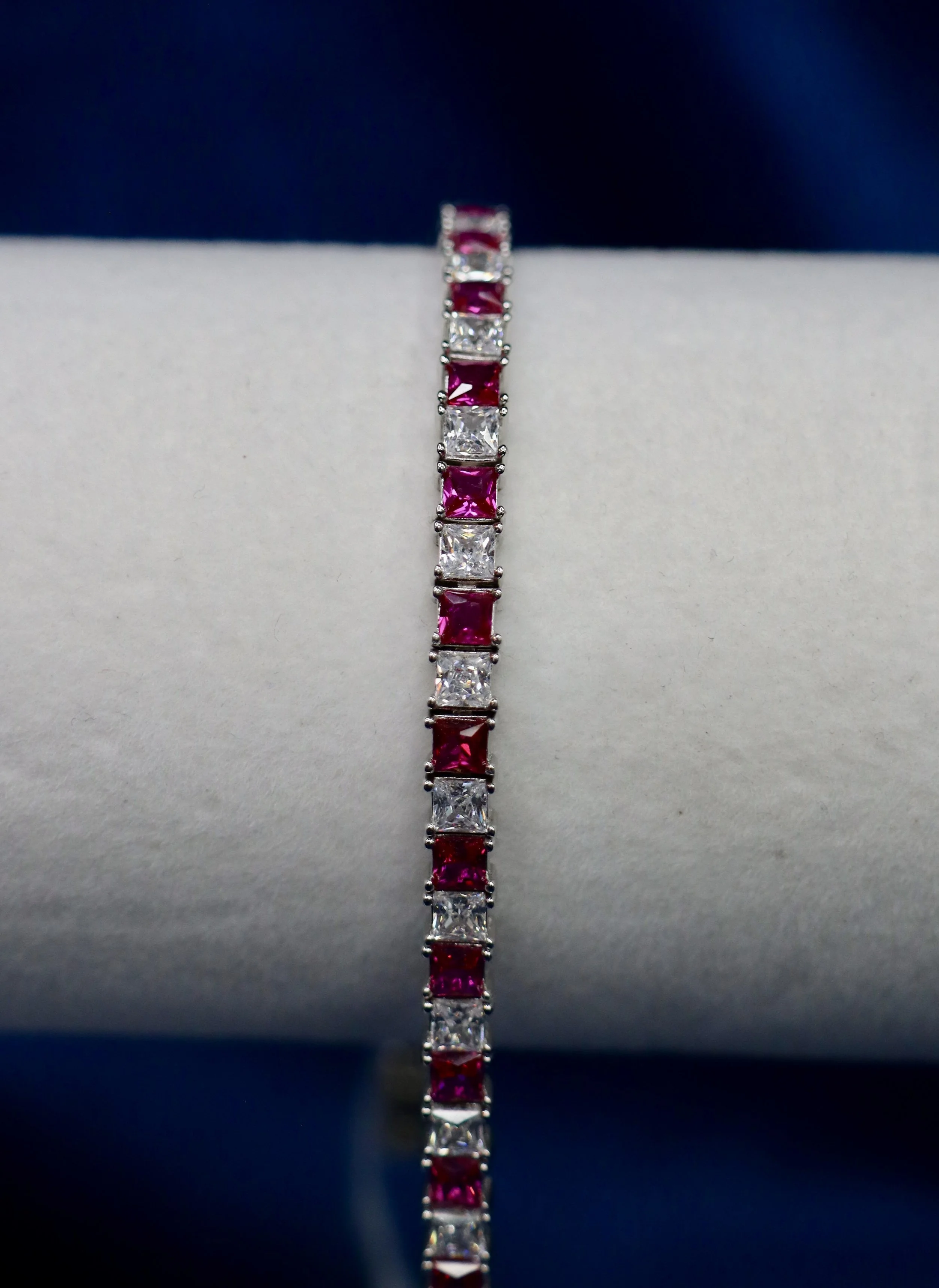 Square cut ruby and CZ tennis bracelet