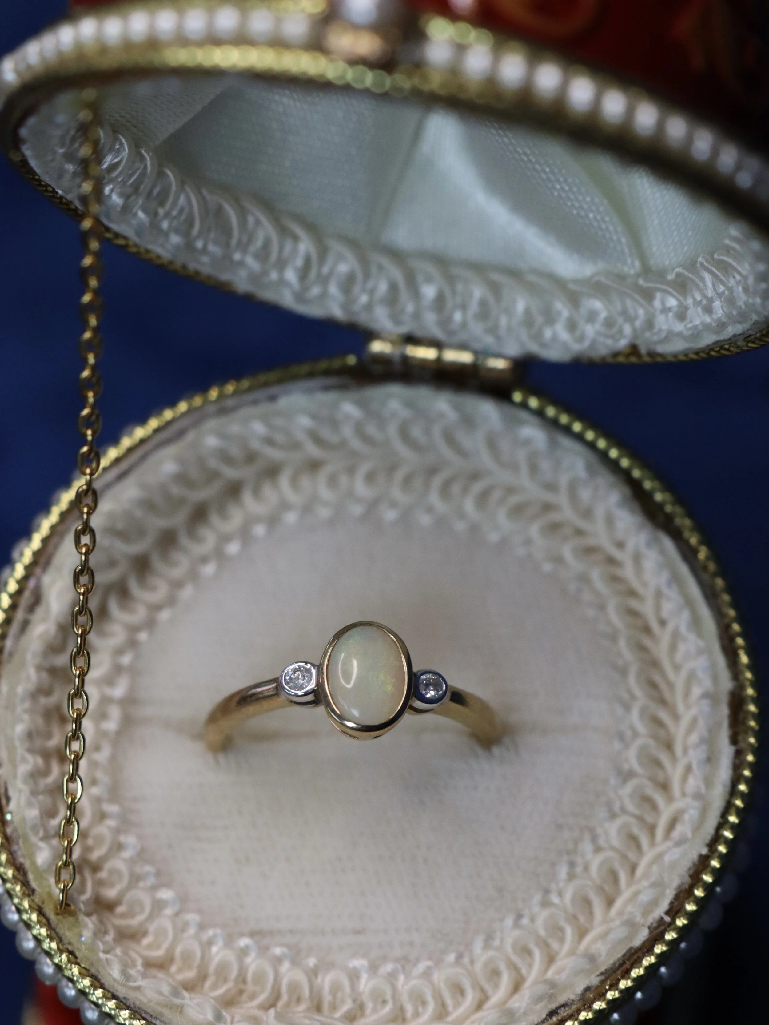 9 Carat Gold Opal and Diamond Three-Stone Bezel Ring