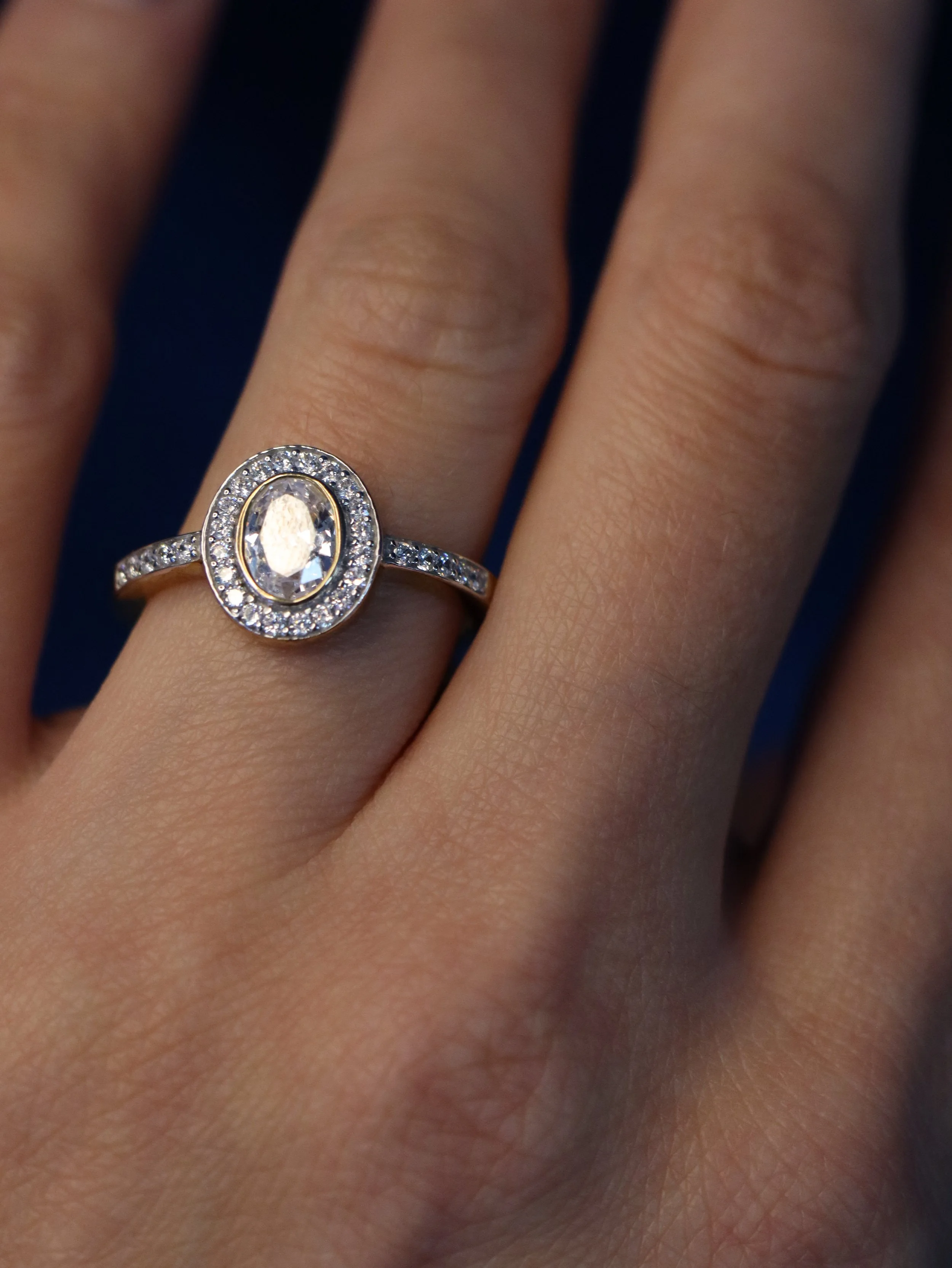 9ct yellow gold oval halo ring with stone-set shoulders, Size - Q