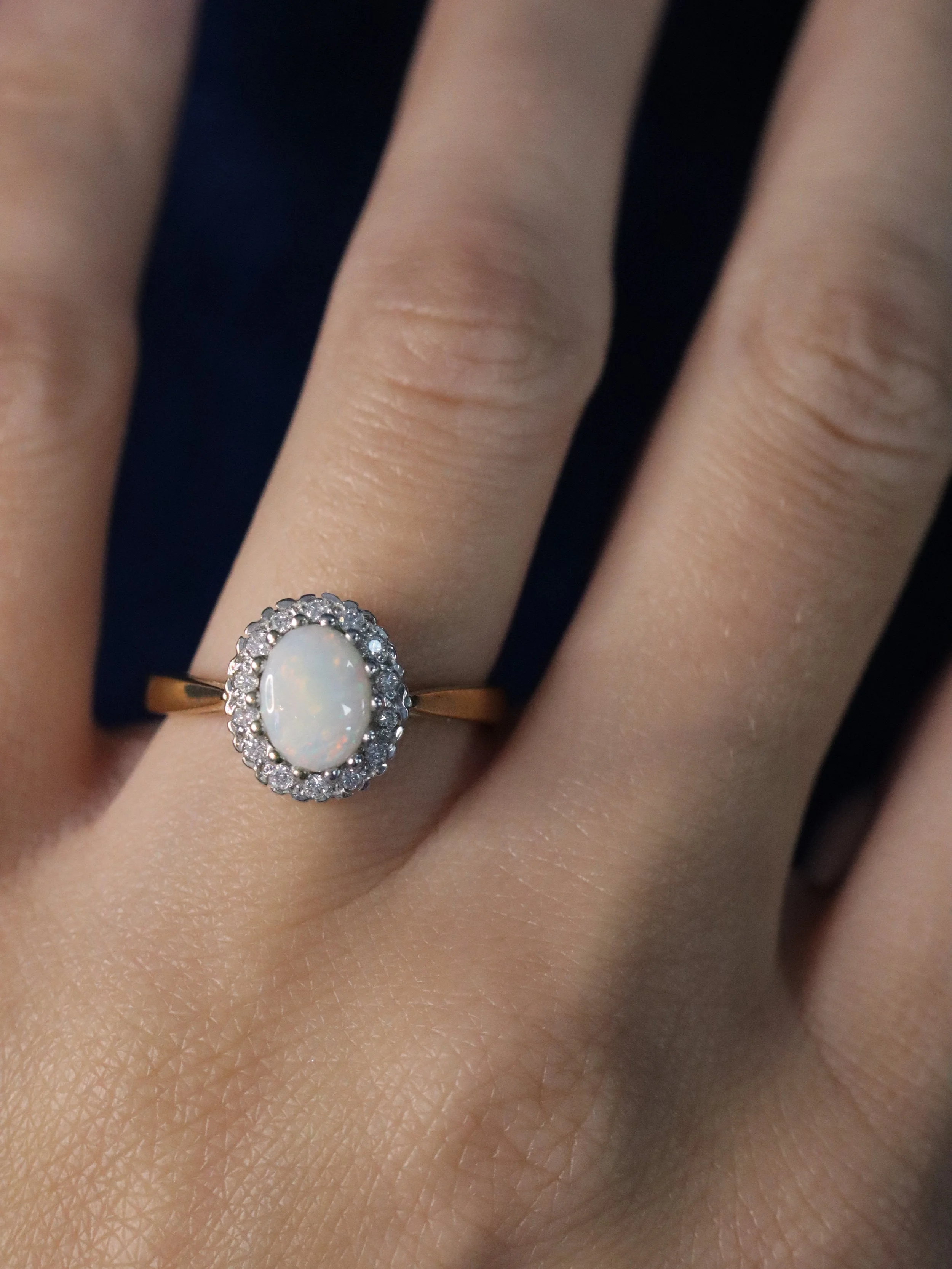 Opal & Diamond Halo Elegance Ring in 9ct Gold Setting
