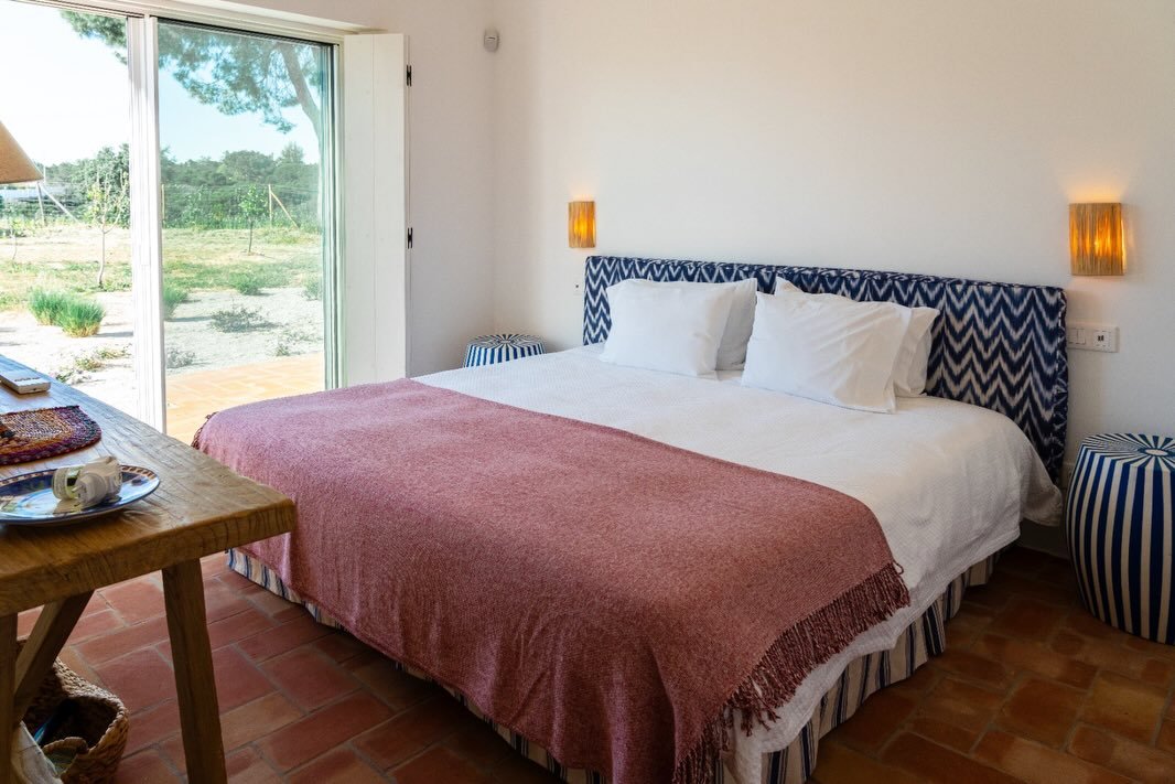 Quarto do Anc&atilde;o is our ode to Praia do Anc&atilde;o, the beach where we spent so many of our childhood summers 

Much like Anc&atilde;o itself, the room is calm, airy, and filled with soft tones of blue and white, opening directly onto the gar