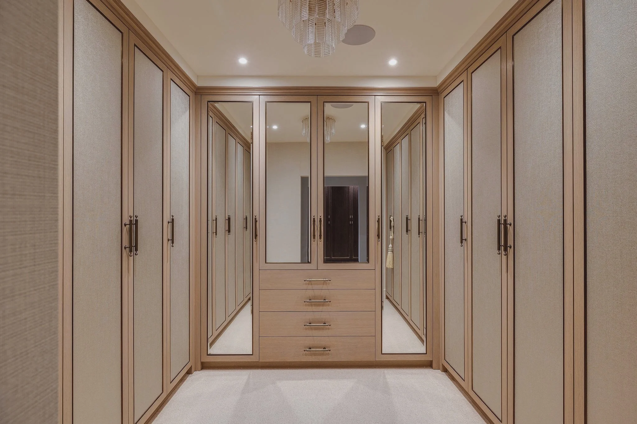 Bespoke Female Dressing Room, stained timber with bronze inlay and wall-covering insert and mirror into each bespoke door panel. ✨ #oscarbeainteriors #dressingroom #bespokedesign #luxurydesign