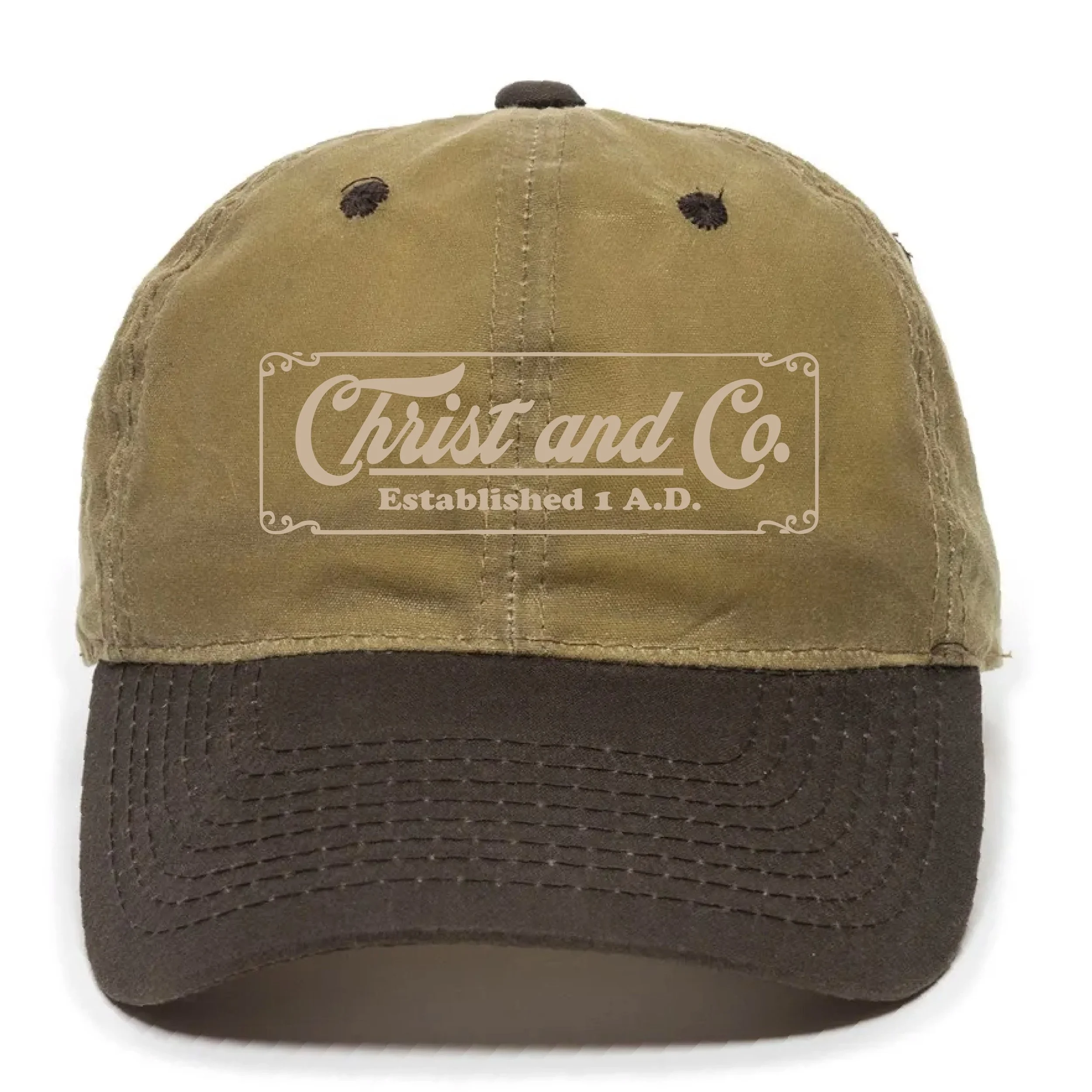 A baseball cap with a beige top and a brown brim, displaying the logo 'Christ and Co.' and a message about being established in 1 A.D.