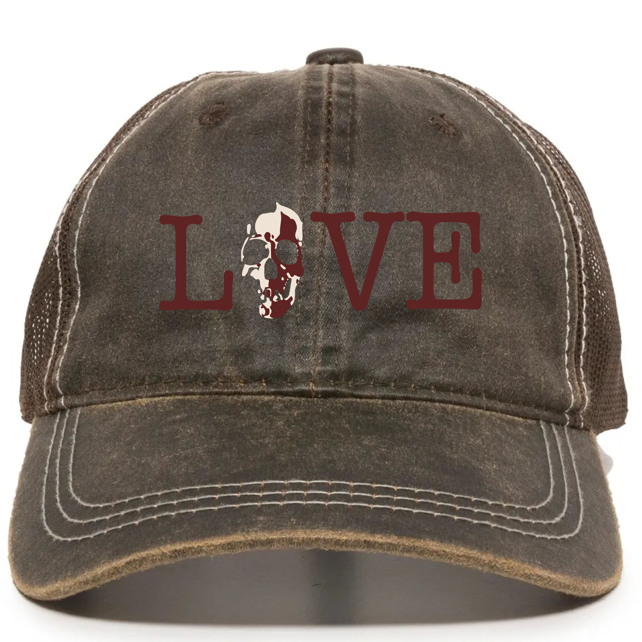 Close up of a brown baseball cap with a white embroidered skull and the word 'LOVE' in red letters.