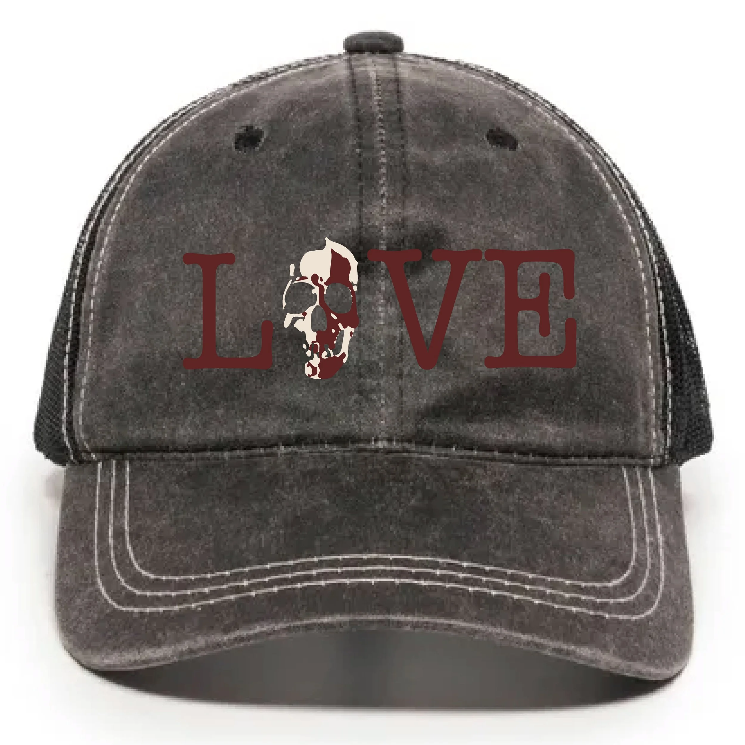 Close up of a black baseball cap with a white embroidered skull and the word 'LOVE' in red letters.
