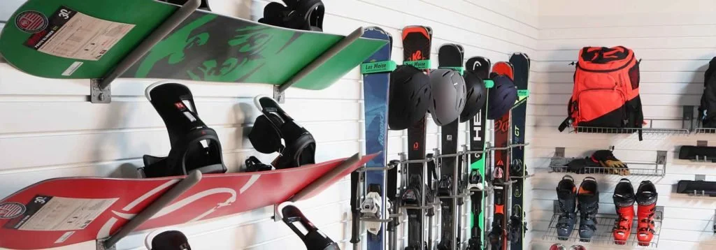 Modular slat walls for storage of winter sports equiptment including ski helmets, snowboards, ski poles, ski boots, and backpacks.