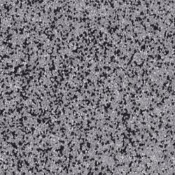 Close-up of a concrete surface with black and gray speckled texture.