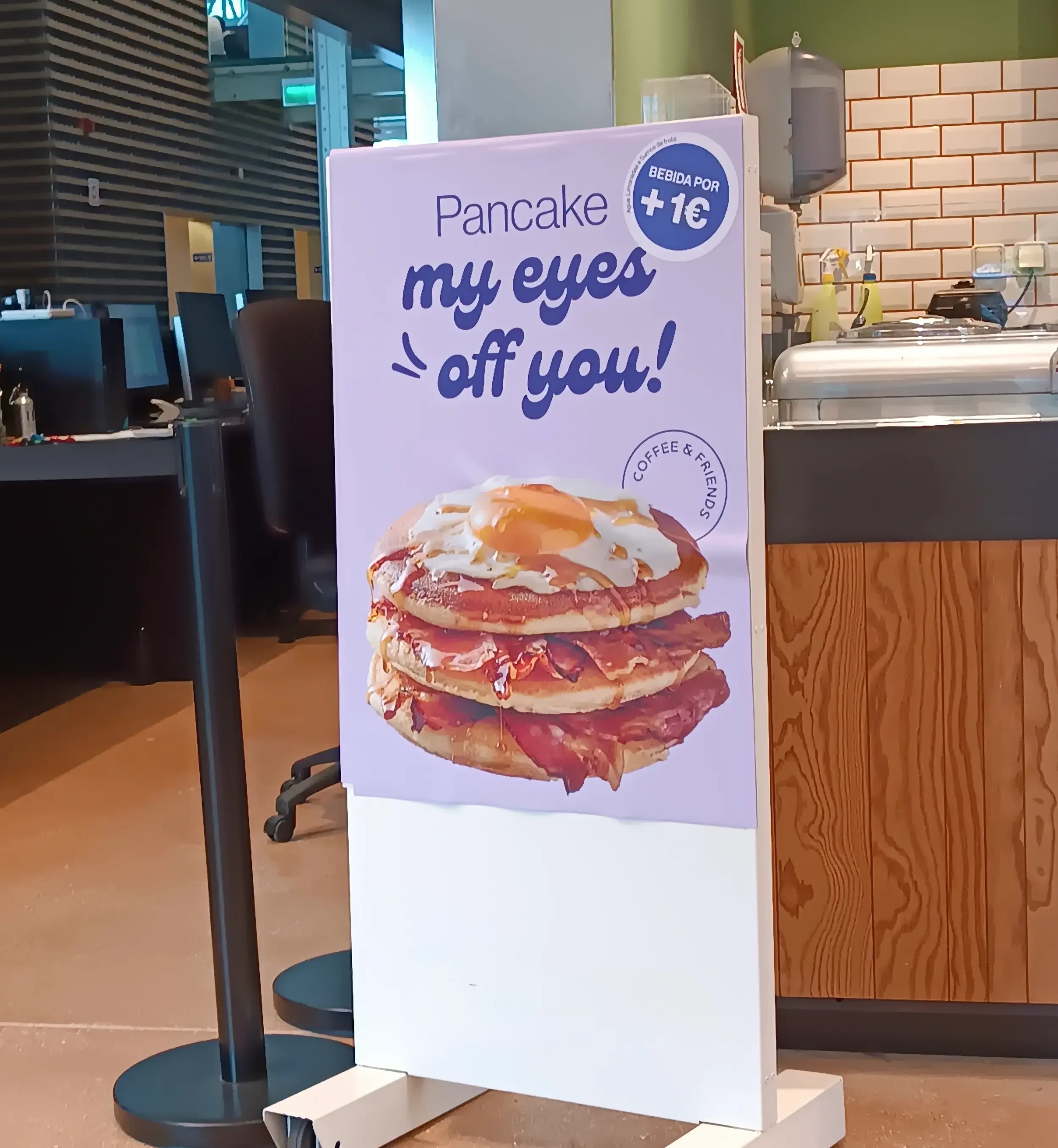 Humorous café advertising poster using the pancake-themed wordplay “Pancake my eyes off you”.