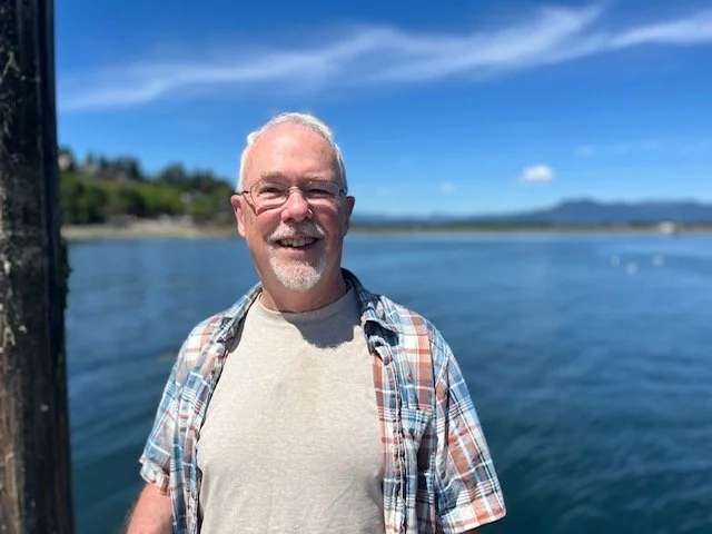 Dr. Chris Shaw on a Cowichan Bay pier.jpeg