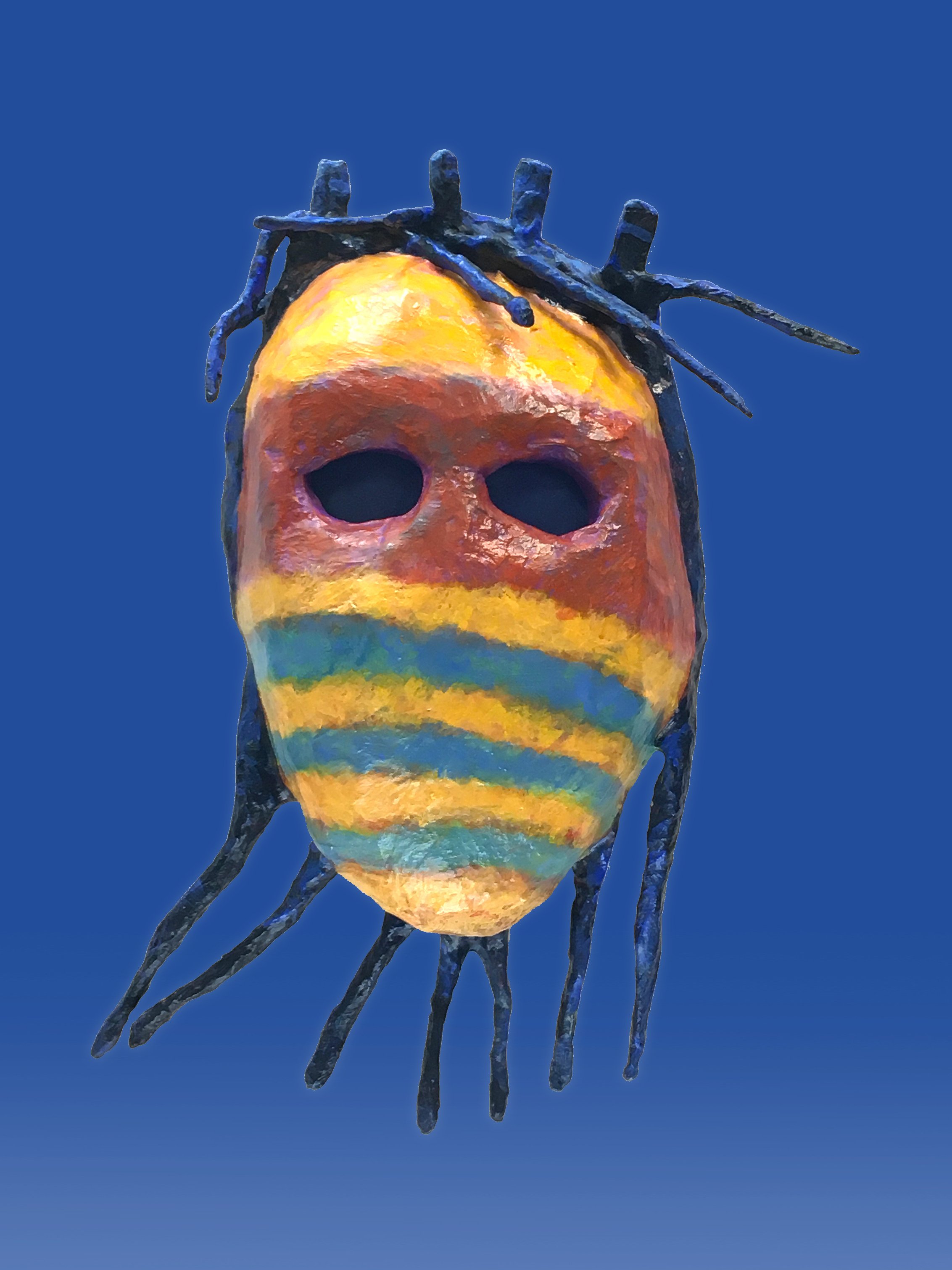 Devorative mask of past lives symbolic meaning