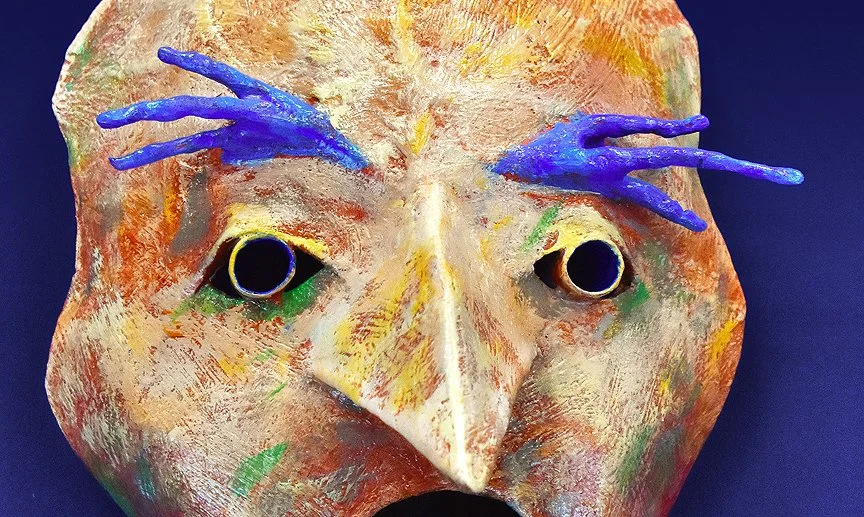 primal mask symbolizing transformation from human to bird
