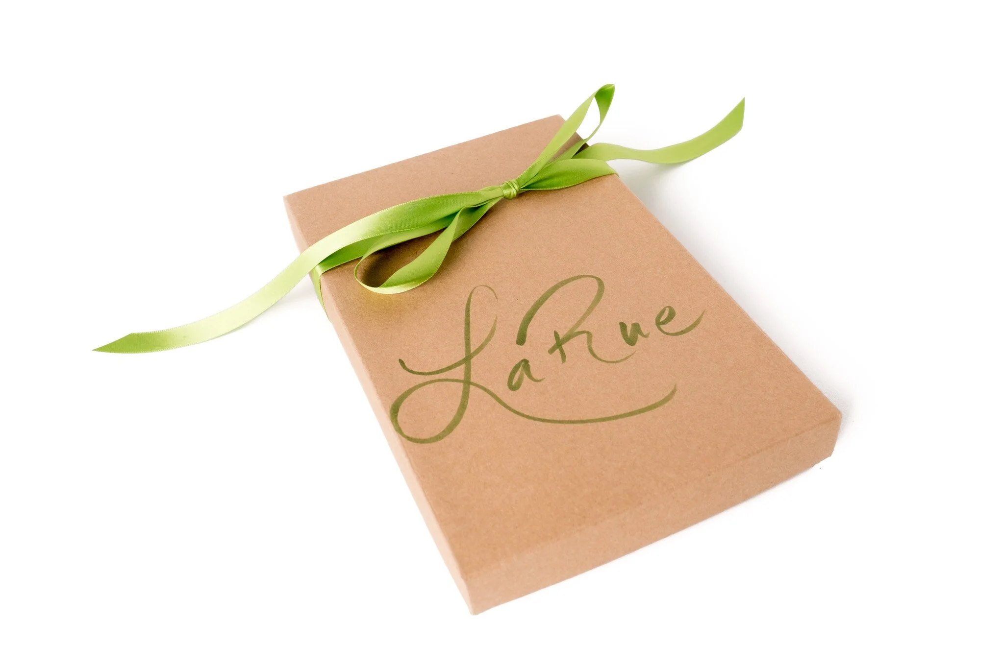 A pink gift box with a green satin ribbon tied in a bow, with the words 'Love' written on top in green cursive.