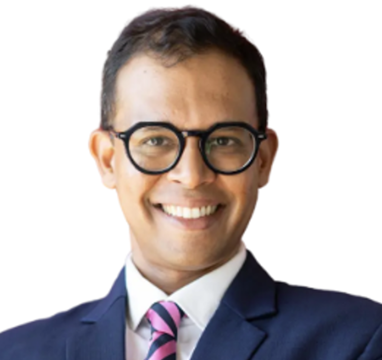 A professional man in a navy suit with a white shirt and pink striped tie, wearing round black glasses, smiling against a white background.
