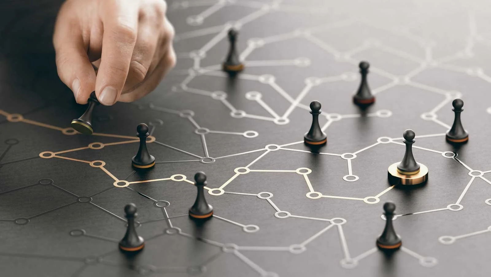 A hand moving a chess pawn on a modern, stylized board with interconnected circular nodes and lines, symbolizing strategy or network.