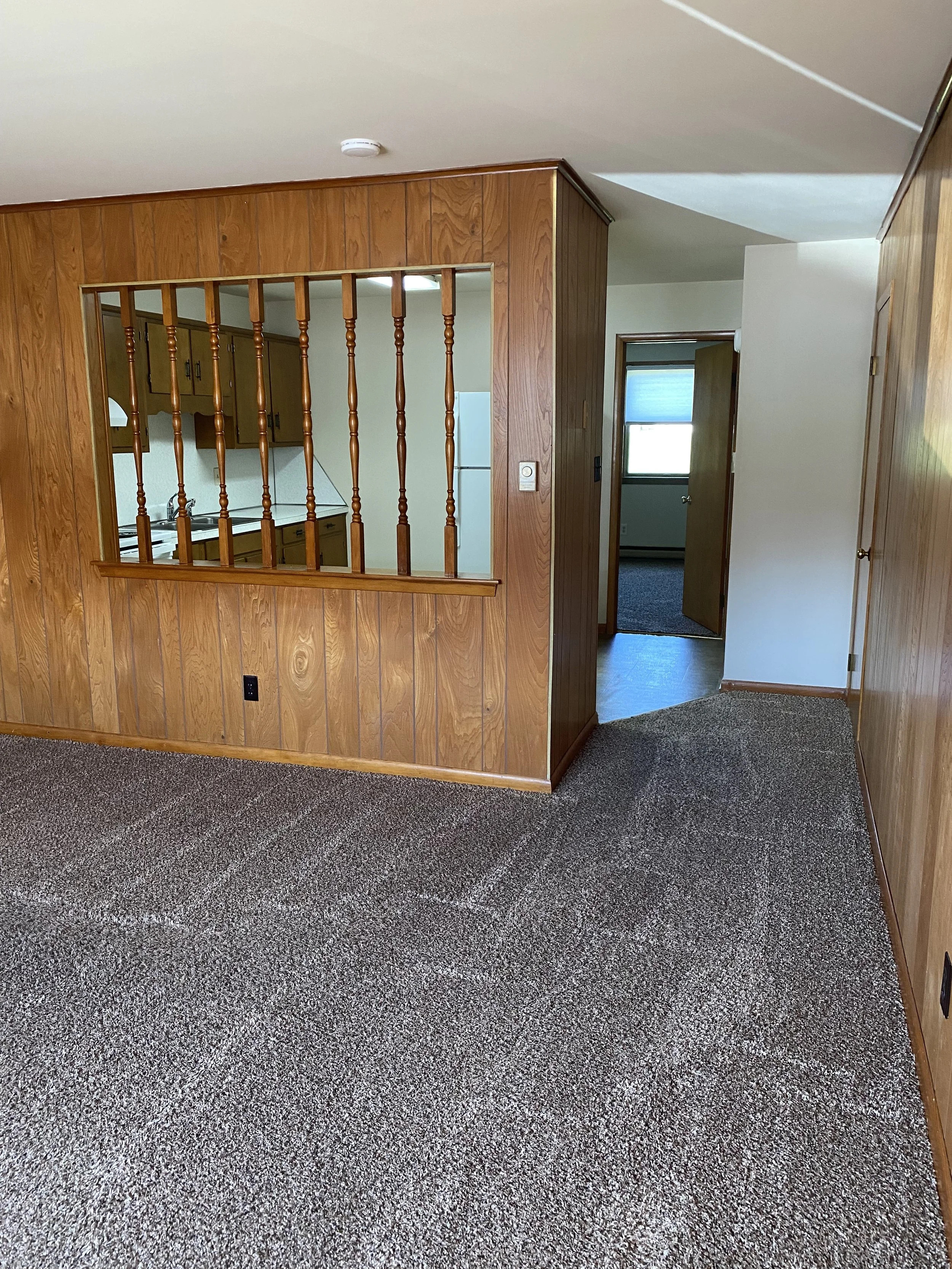 13912 #3 Living room into kitchen, bedroom.jpg
