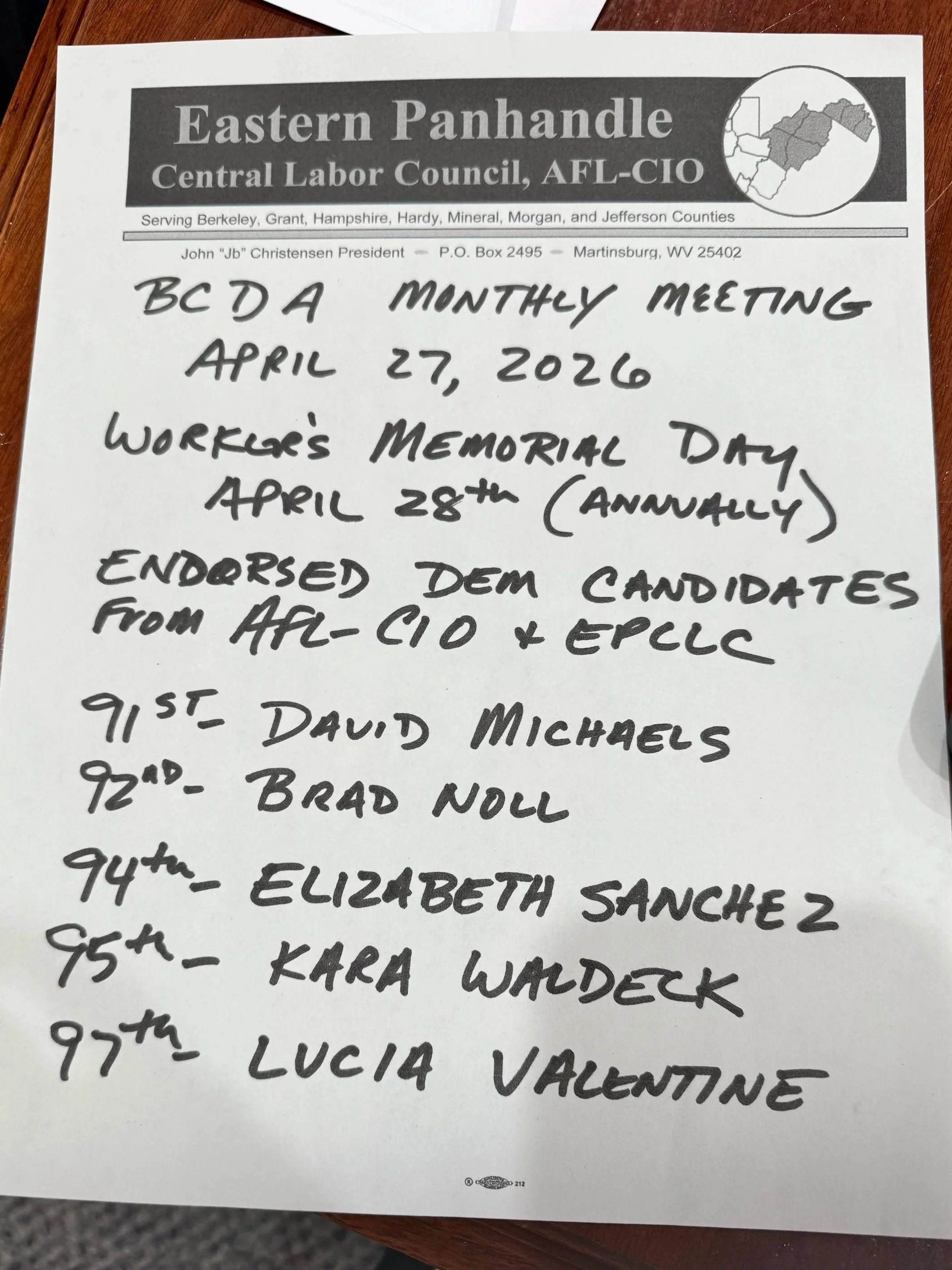 A handwritten list of names and dates on a piece of paper from a meeting of the Eastern Panhandle Central Labor Council in April 2022. The paper features a printed header with a map of West Virginia and a label for the organization.