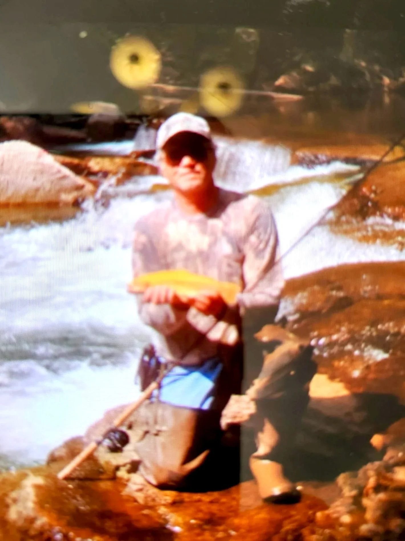 Brad Noll with a golden trout
