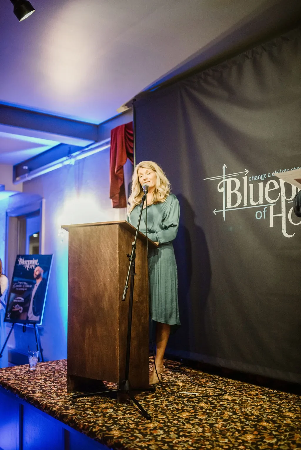 casa-blueprint-of-hope-2026-speaker-at-podium-program-04.webp