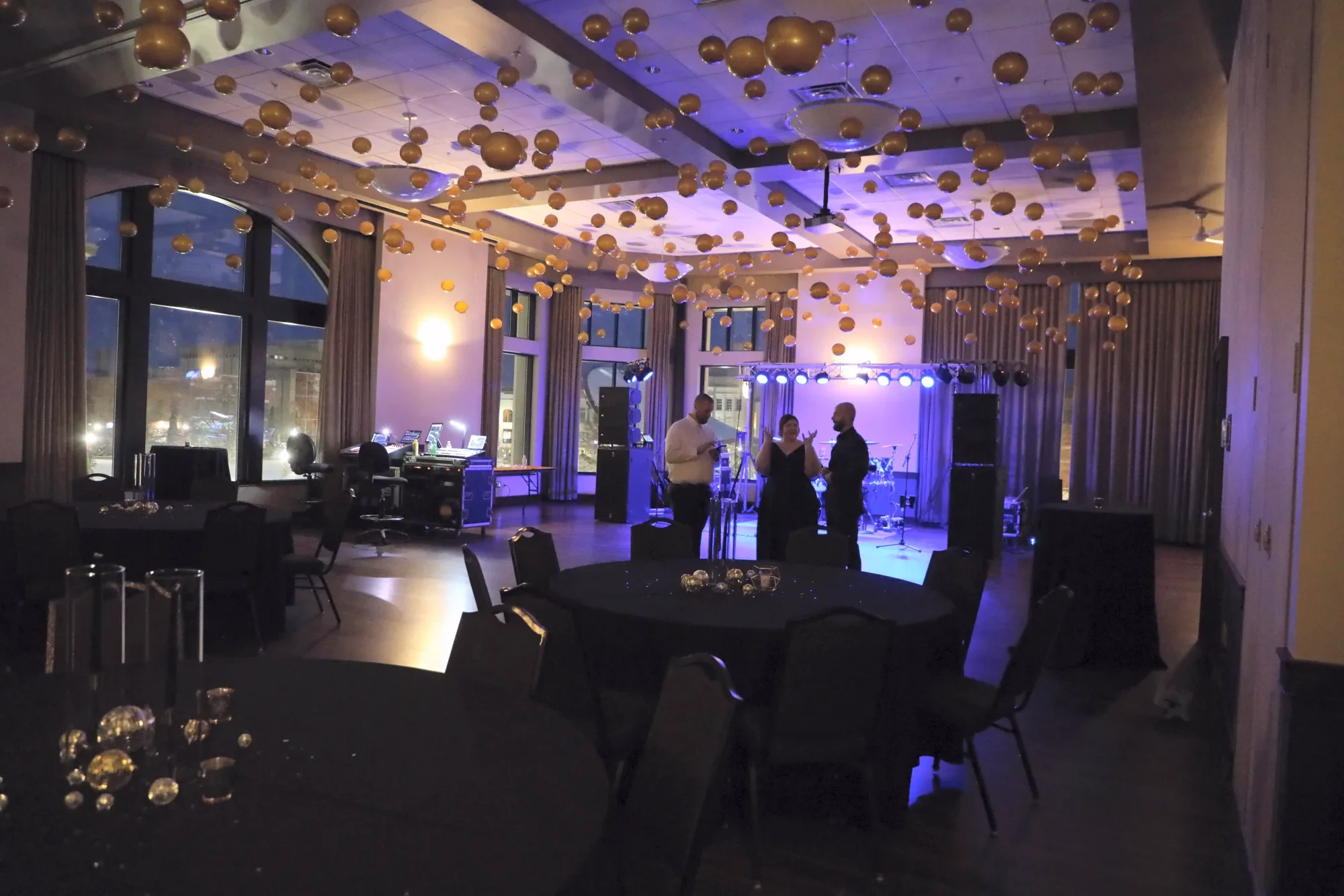 aqua-new-years-gala-2025-venue-setup-ballroom-blue-uplighting.webp