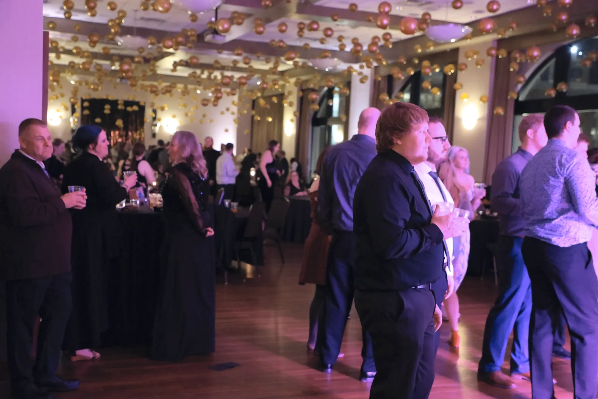aqua-new-years-gala-2025-guests-dance-floor-action.webp