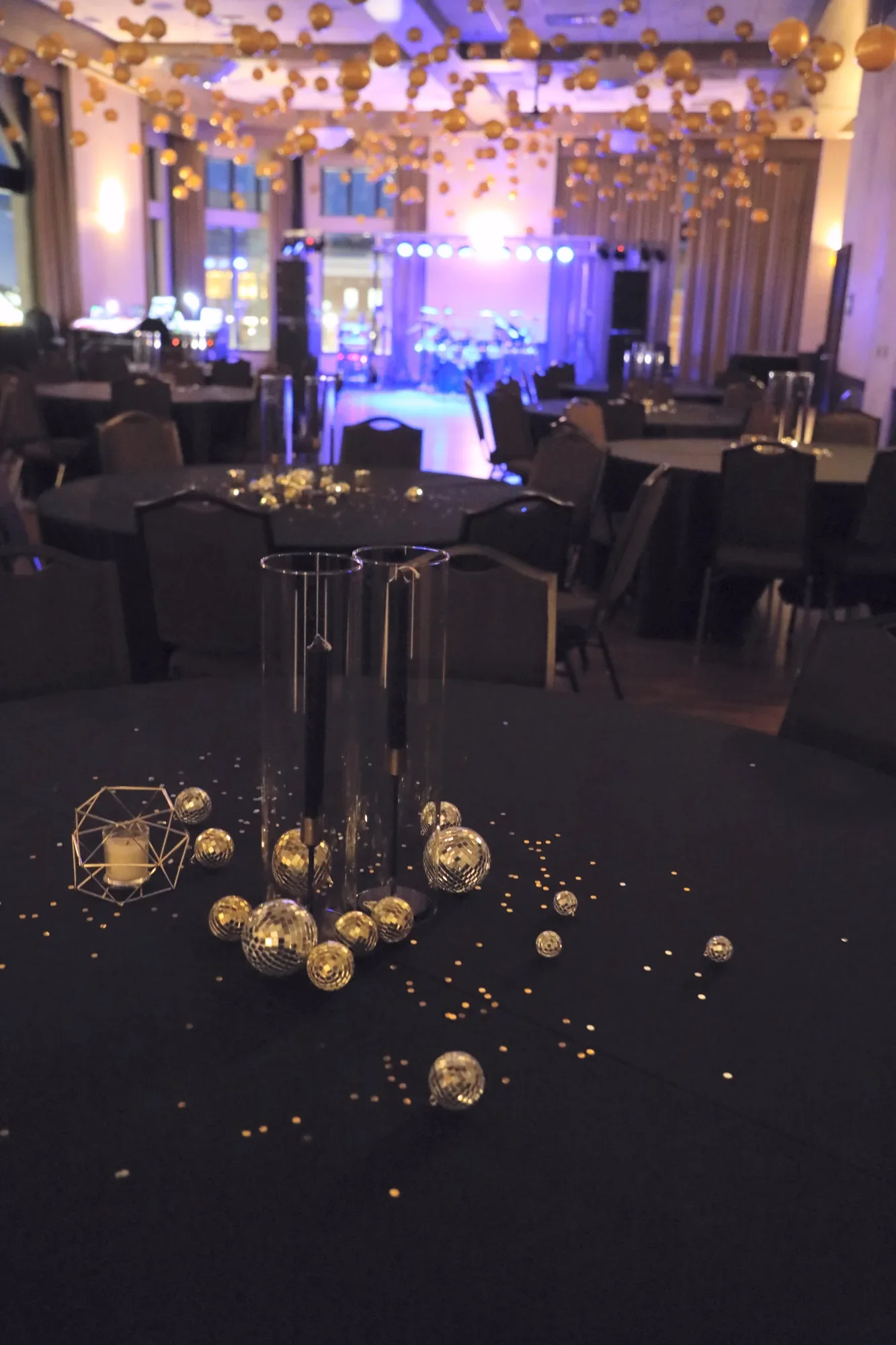 aqua-new-years-gala-2025-venue-setup-candle-tablescape-detail.webp