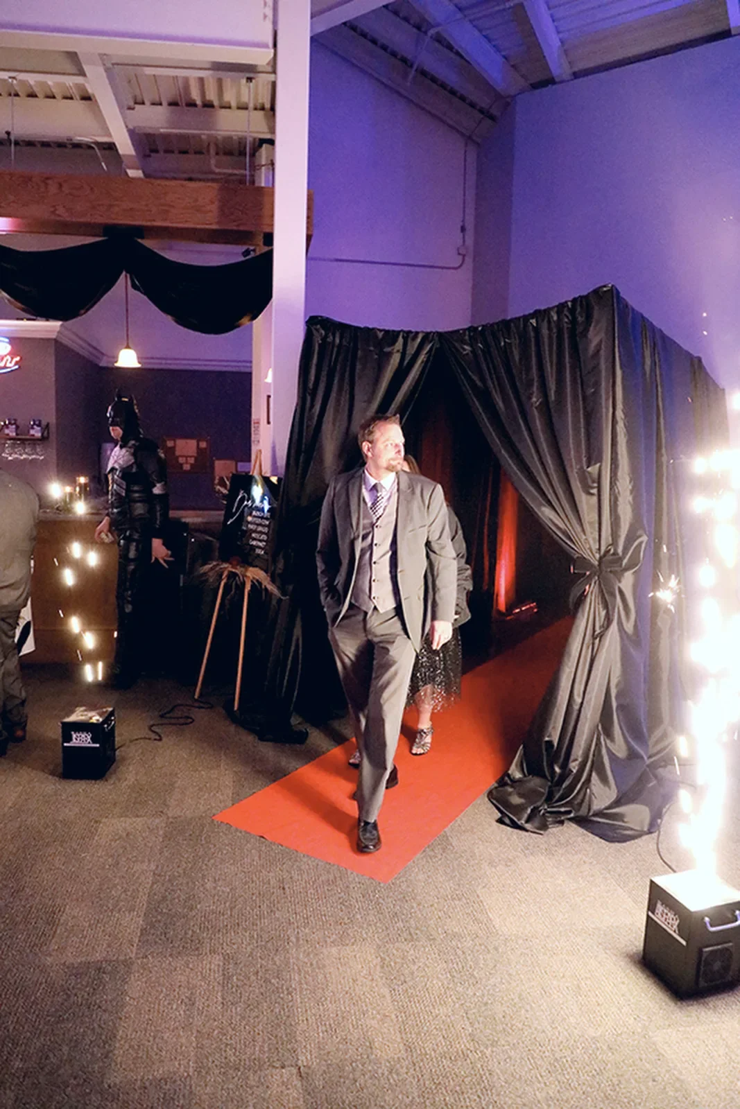 aqua-christmas-masquerade-2022-candid-grand-entrance-guests-with-coats.webp