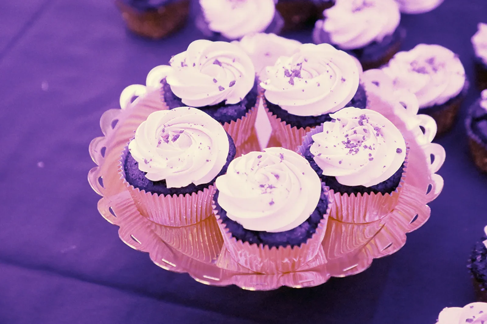 aqua-christmas-masquerade-2022-decor-cupcake-tower-pink-light.webp