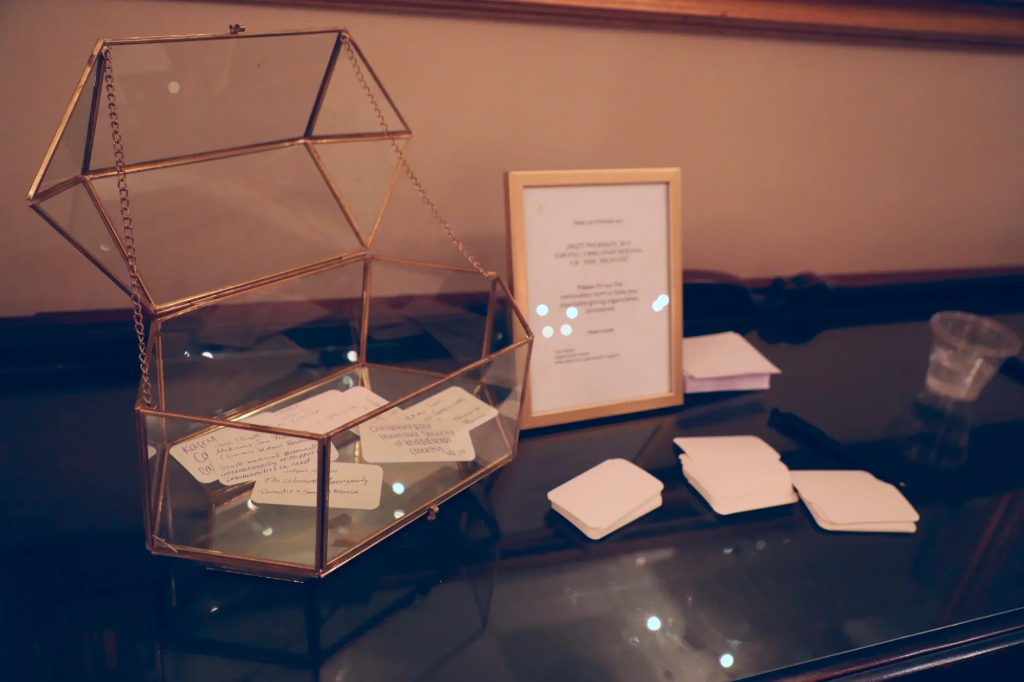 aqua-new-years-gala-2025-decor-card-display-glass-case.webp