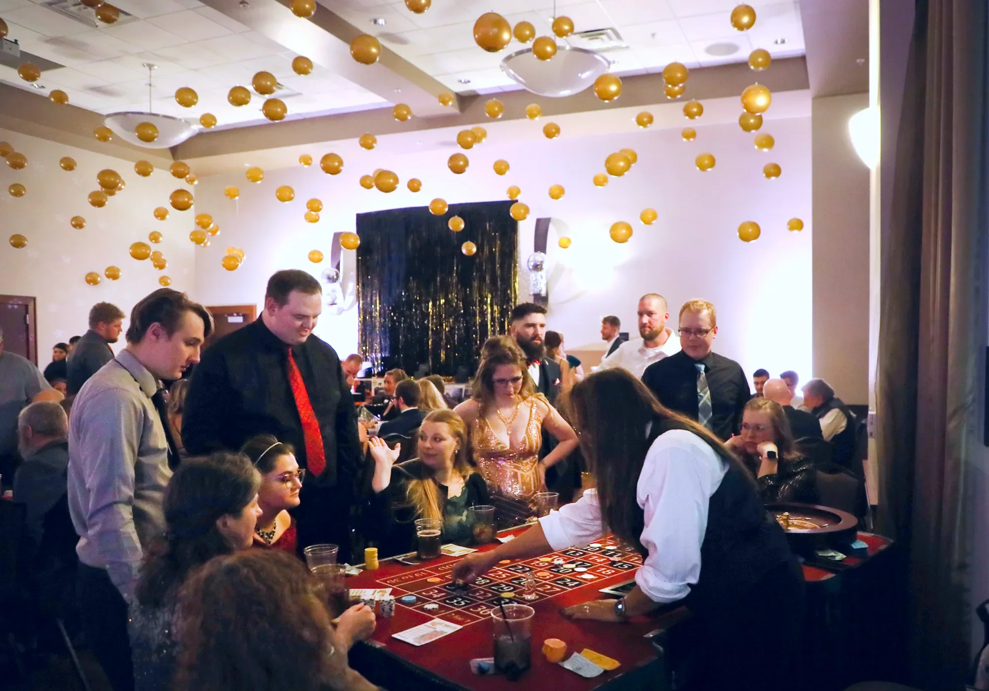 aqua-new-years-gala-2025-guests-late-night-cocktail-table.webp