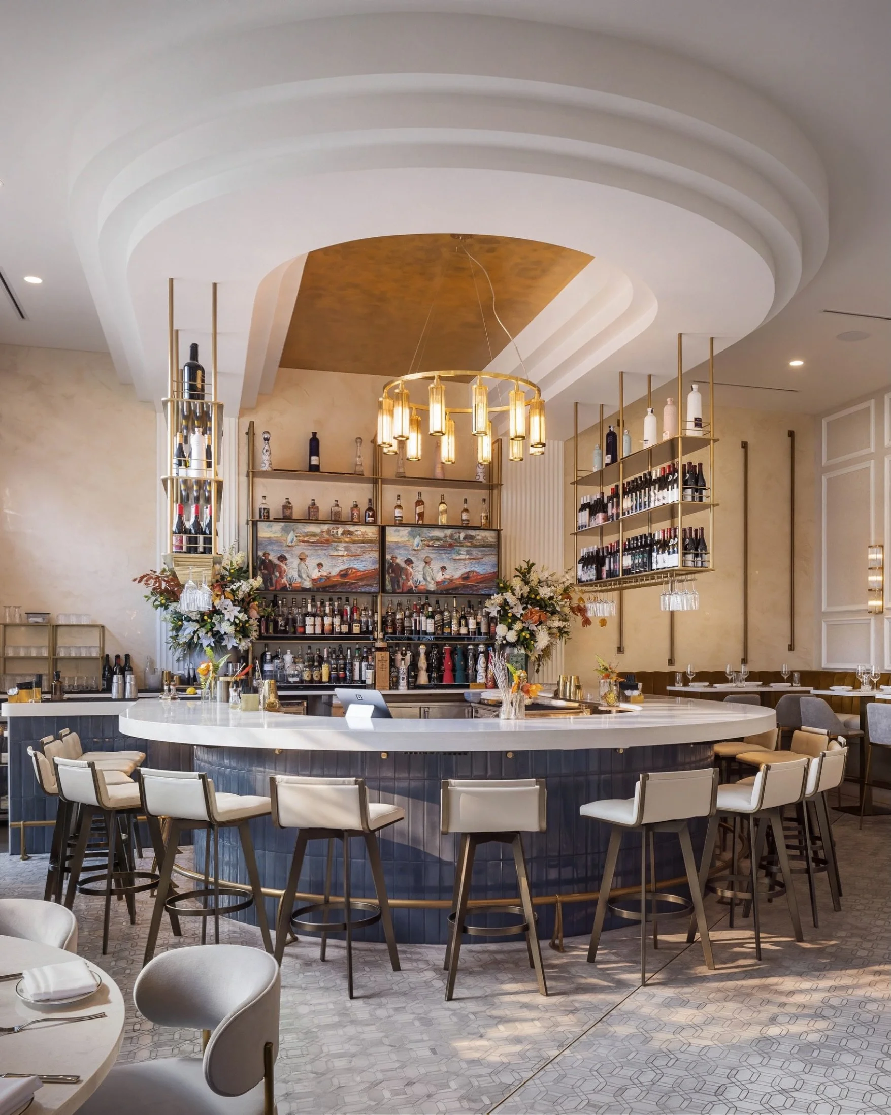 A closer look at one of our recent projects for the @thelandonrestaurant in Tampa. Curved booths, brass accents, and statement lighting give the dining room its character, with a central bar that draws you into the space. 

Soft upholstery and genero