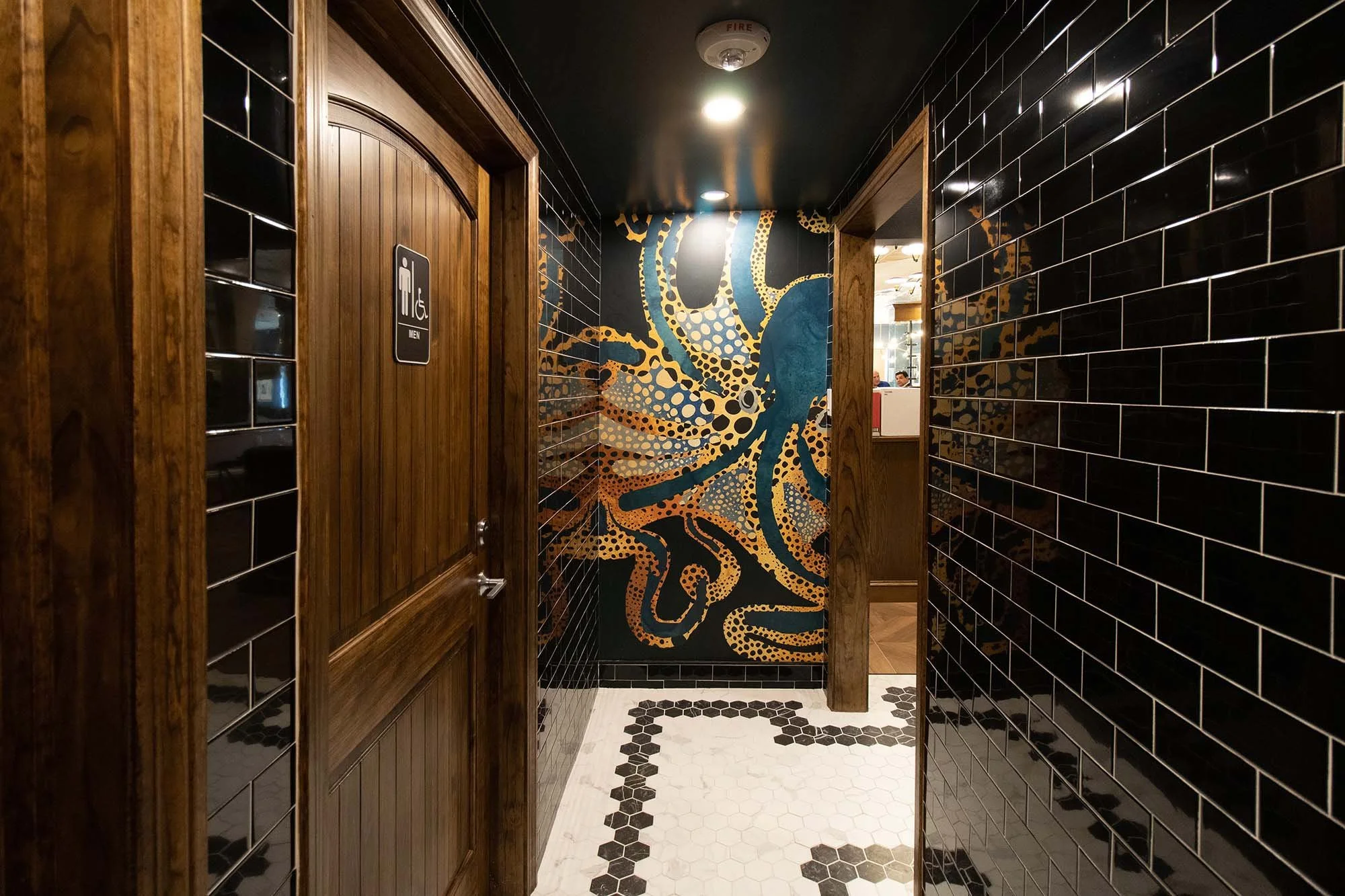 black subway tile+octopus+wallpaper.jpg
