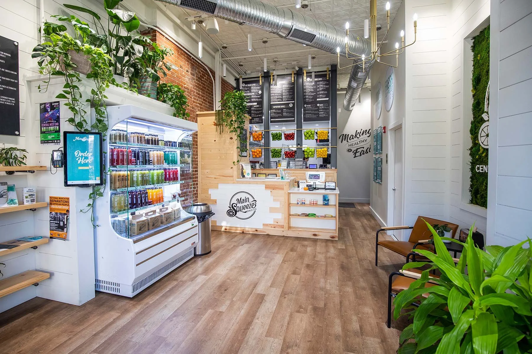 juice shop+juicing+shiplap+greenery.jpg